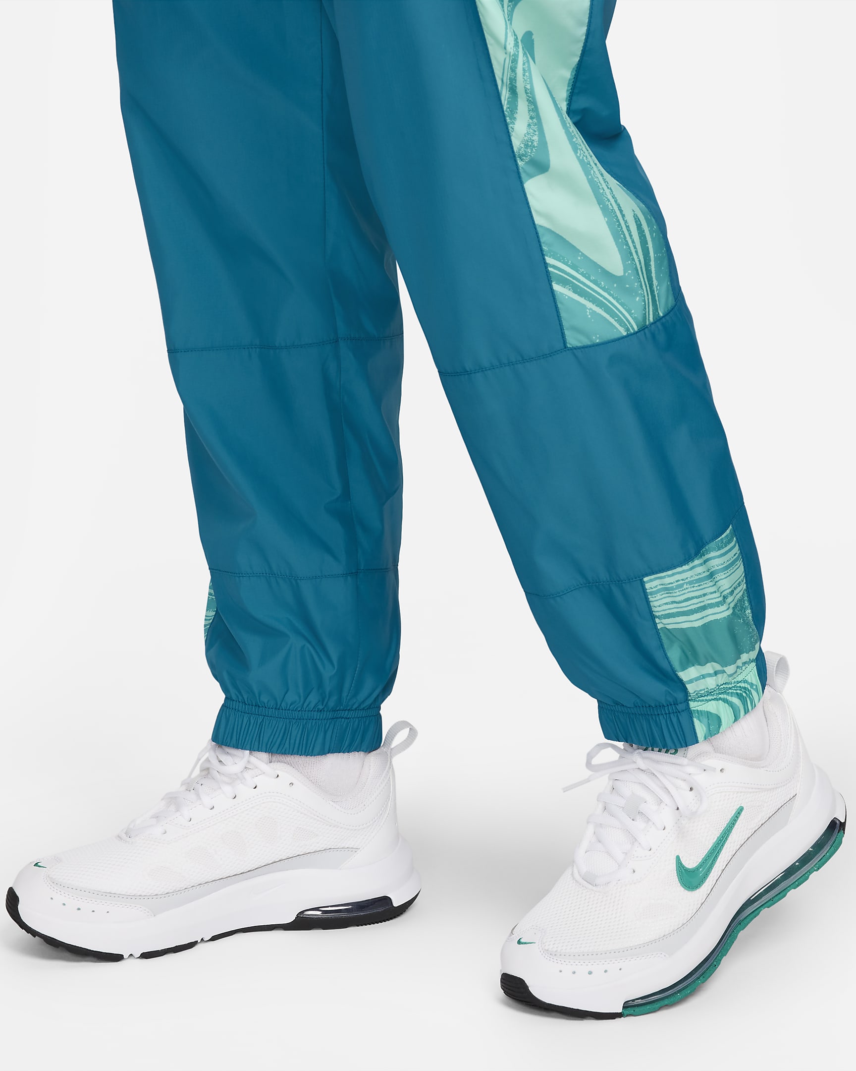 Australia Repel Essential Women's Nike MidRise Graphic Joggers. Nike AU