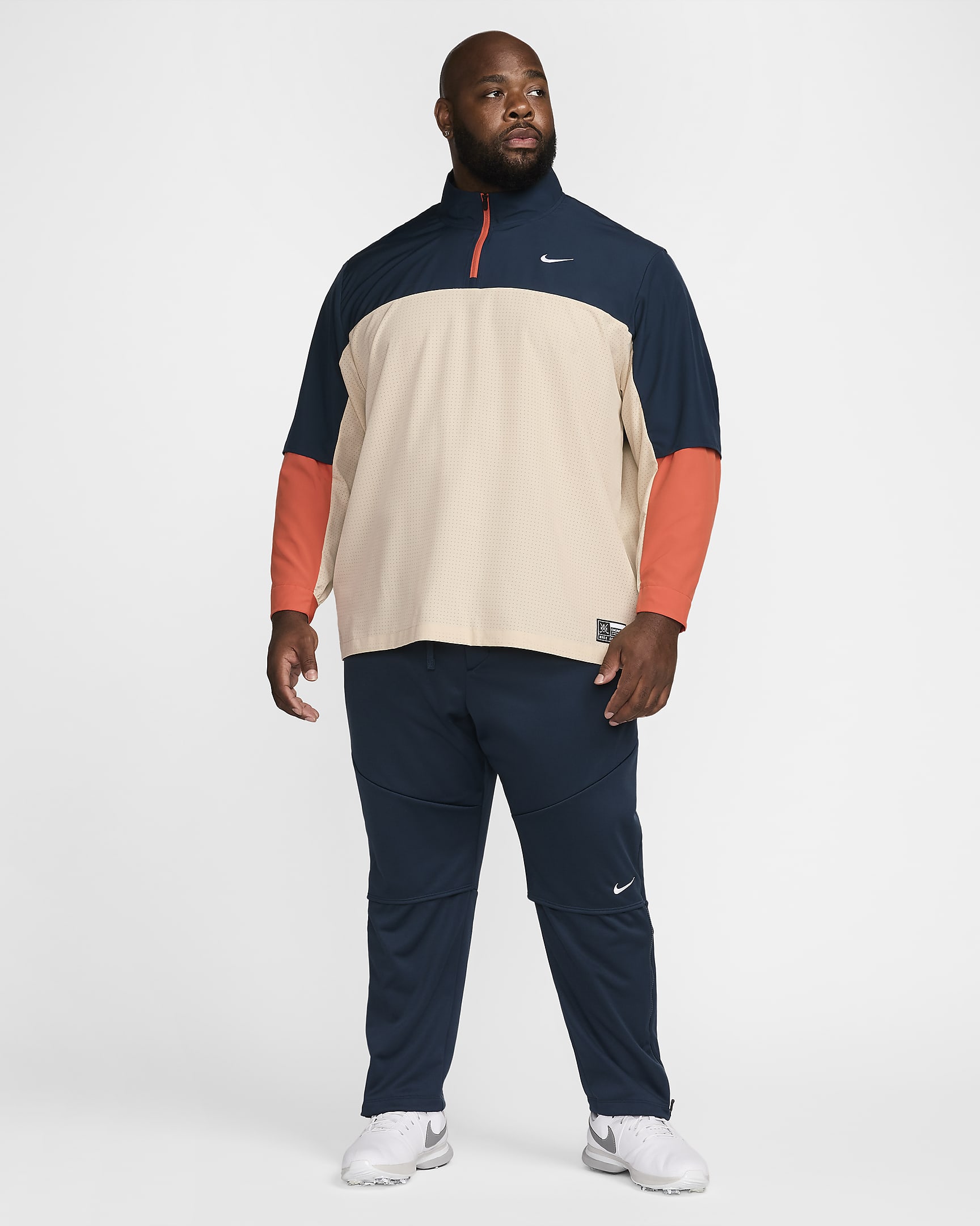 Nike Golf Club Men's Dri-FIT 1/2-Zip Golf Jacket - Sand Drift/Armoury Navy/Vintage Coral/White