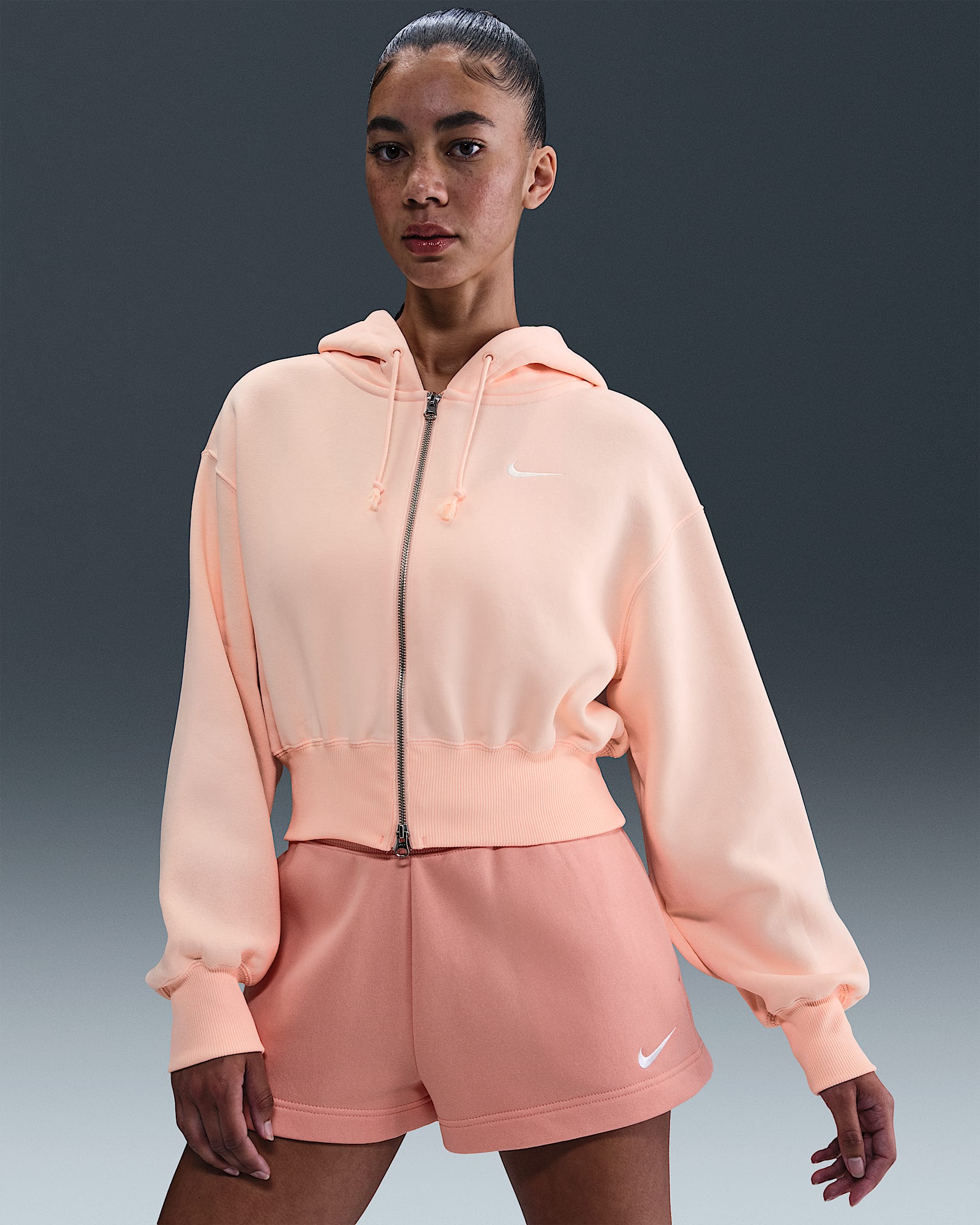 Sudadera con gorro holgada cropped de cierre completo para mujer Nike Sportswear Phoenix Fleece - Coral lavado/Vela