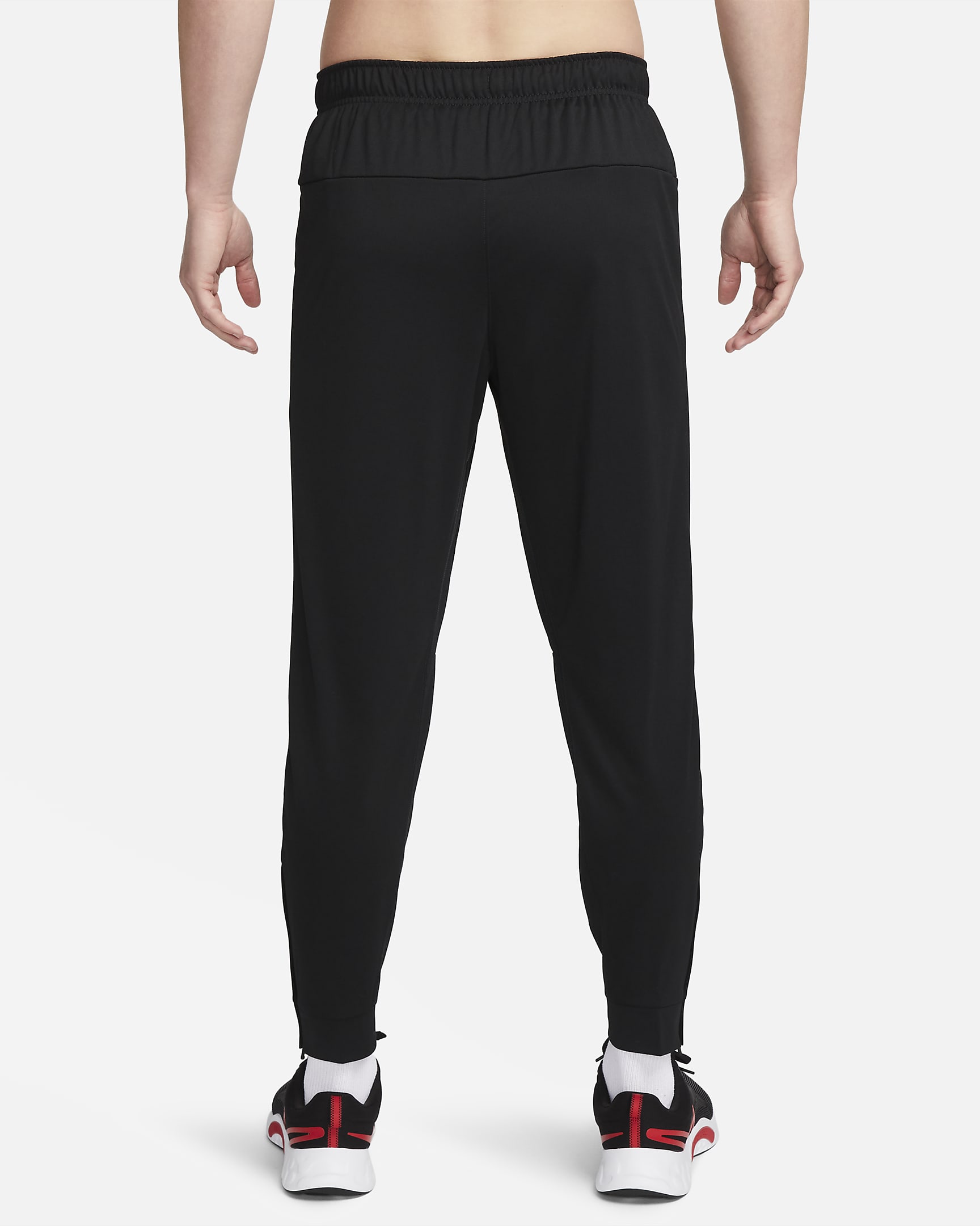 Nike Totality Men's Dri-FIT Tapered Versatile Trousers. Nike BG