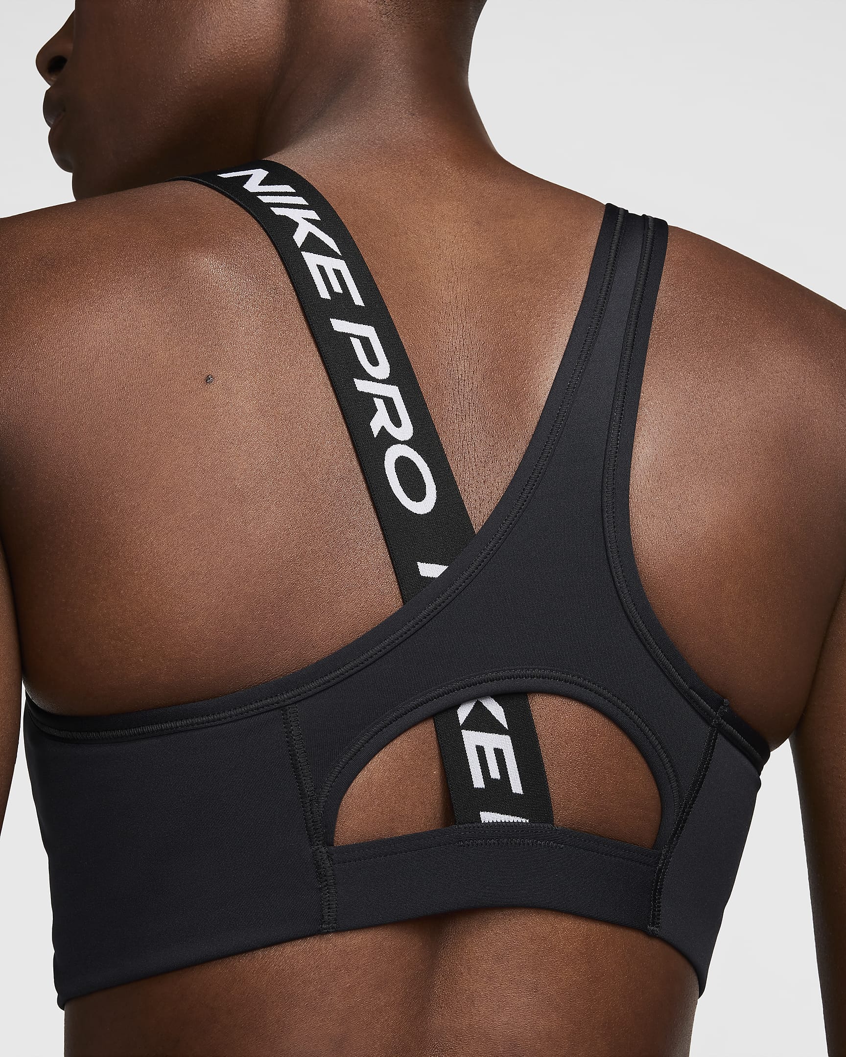 Nike Classic Swoosh Futura Sujetador deportivo de sujeción media con almohadilla - Mujer - Negro/Negro/Blanco/Blanco