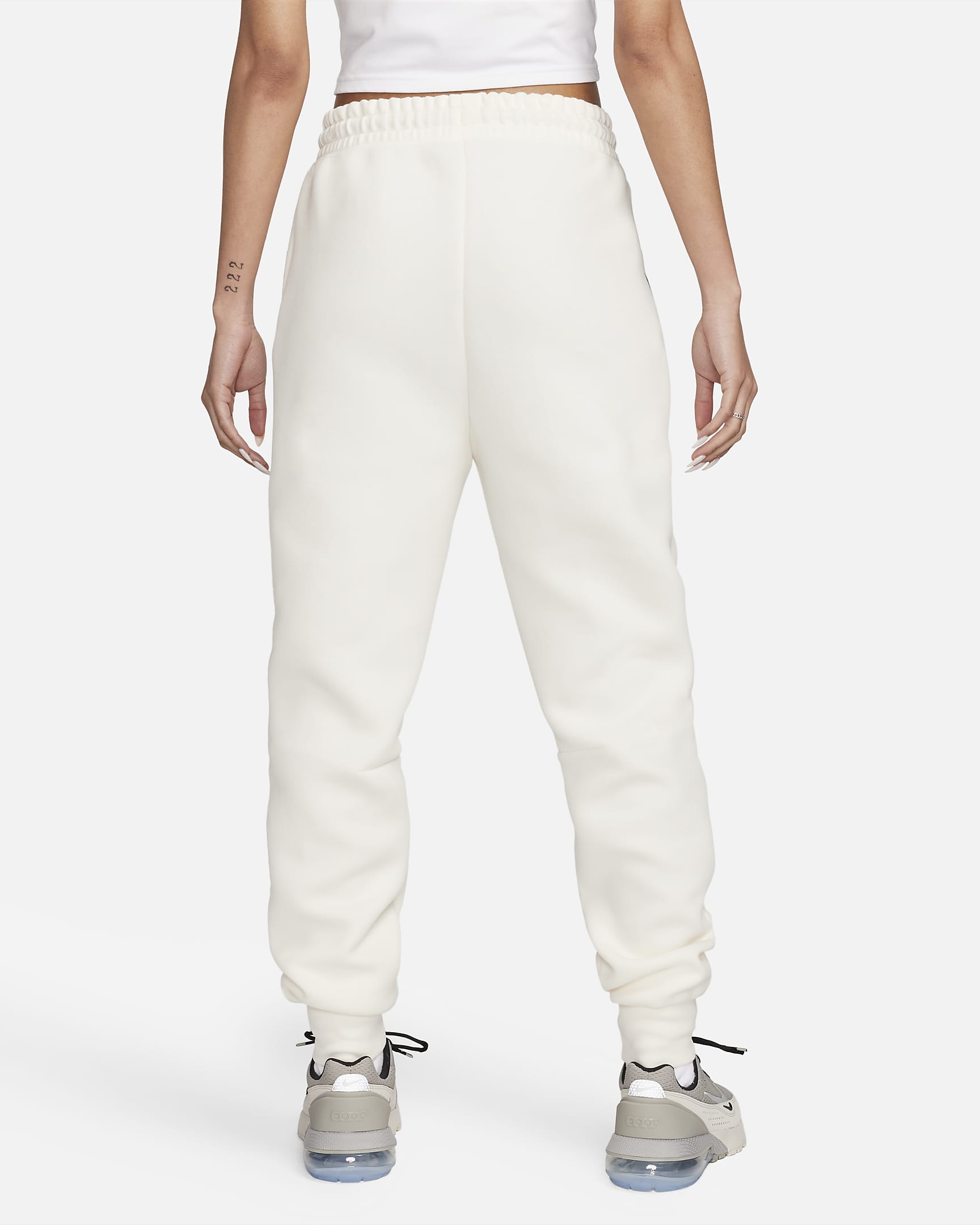 Pantalon de jogging taille mi-haute Nike Sportswear Tech Fleece pour femme - Pale Ivory/Noir