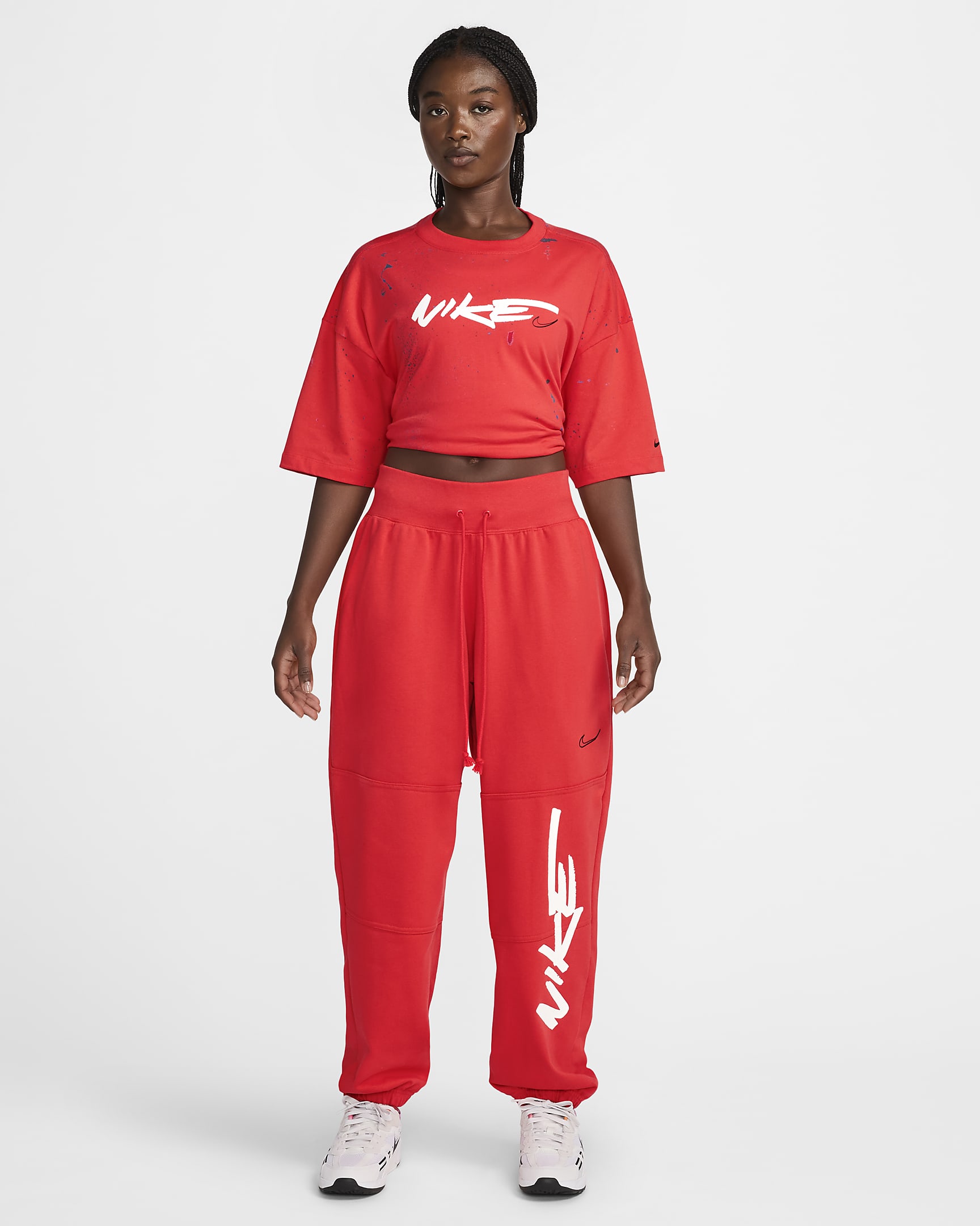 Nike Sportswear Breaking Women's Oversized Short-Sleeve T-Shirt - Light Crimson