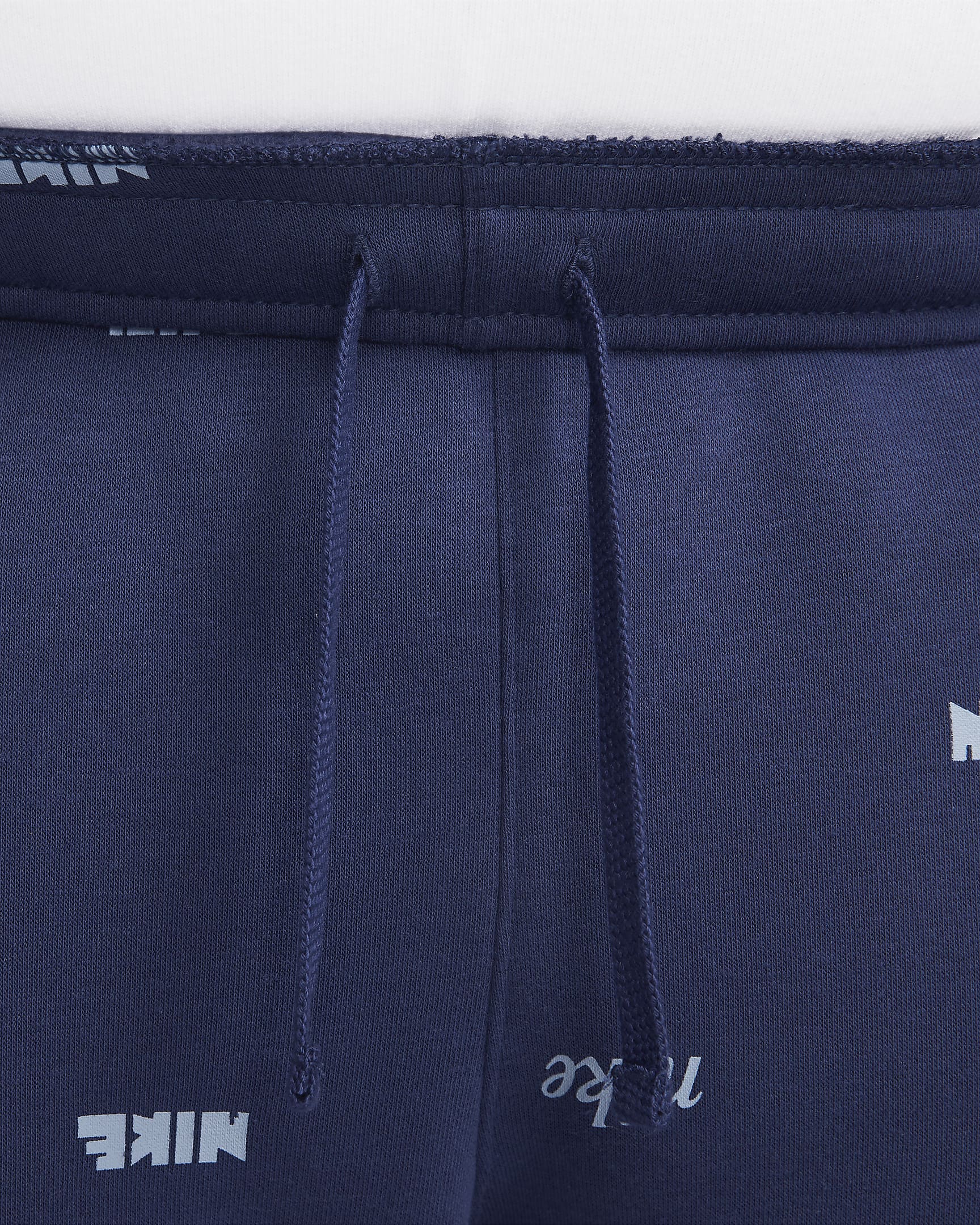 Nike Club Fleece Men's BrushedBack Allover Print Joggers.