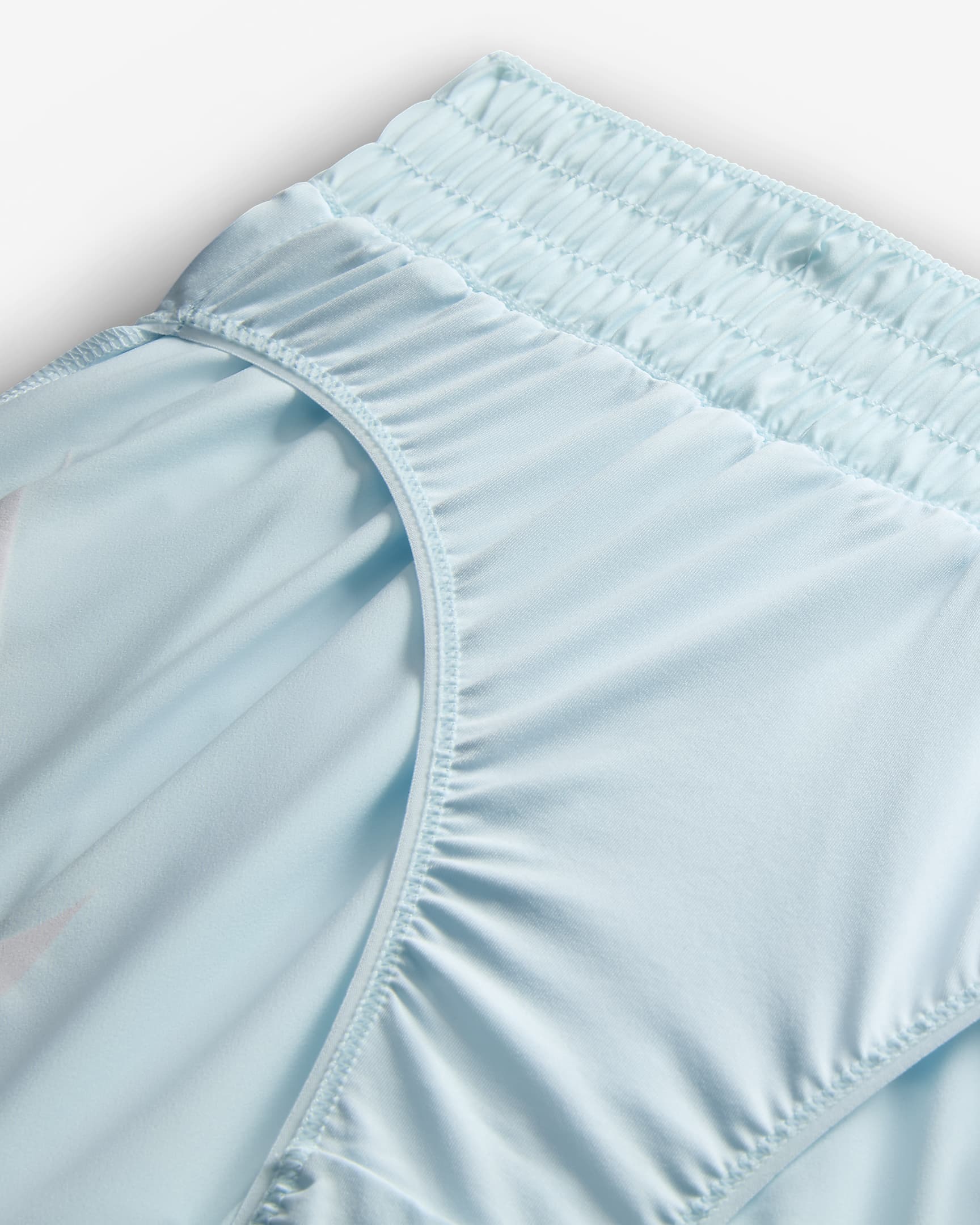 Nike One Dri-FIT damesshorts met halfhoge taille, graphic en binnenbroekje - Glacier Blue/Aster Pink