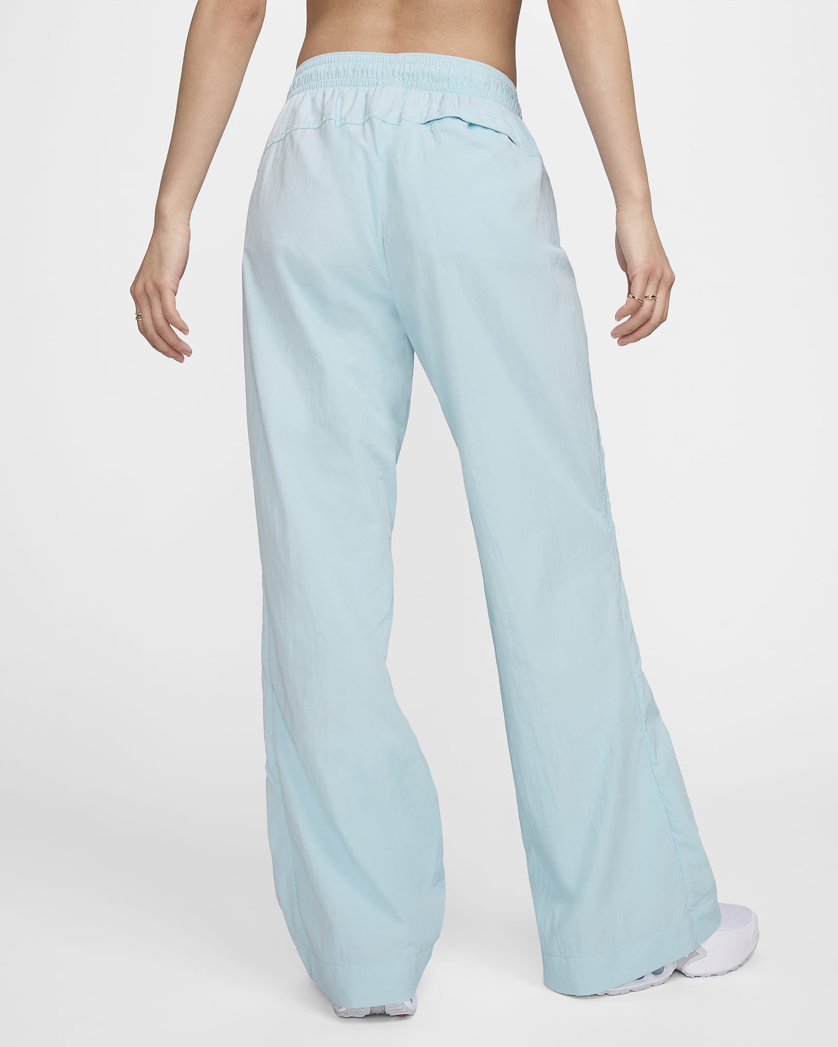 Pantalon à zip taille mi-haute déperlant Nike Sportswear Collection pour femme - Glacier Blue/Blanc