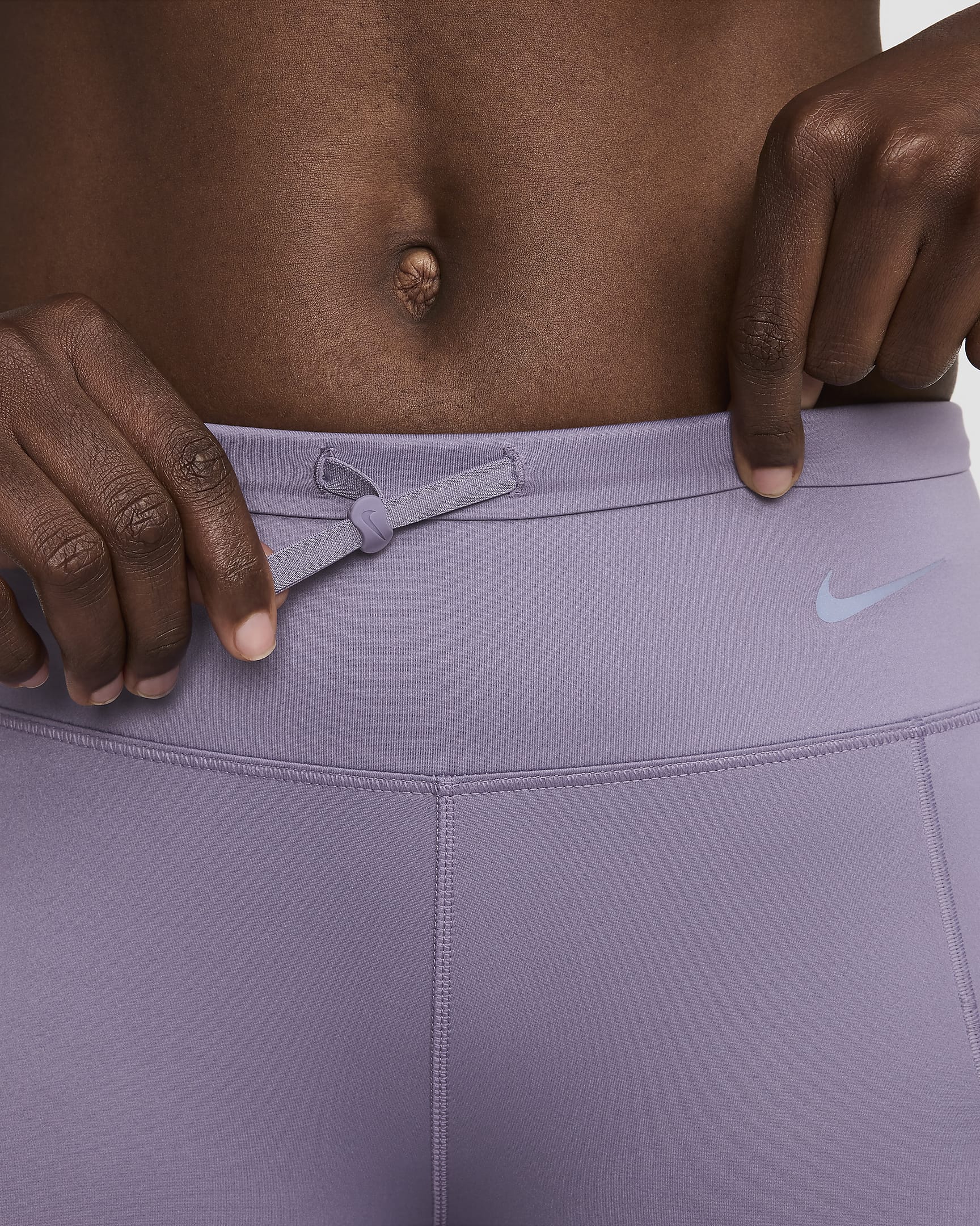 Nike Go Leggings de 7/8 de cintura mitjana i subjecció ferma amb butxaques - Dona - Daybreak/Negre