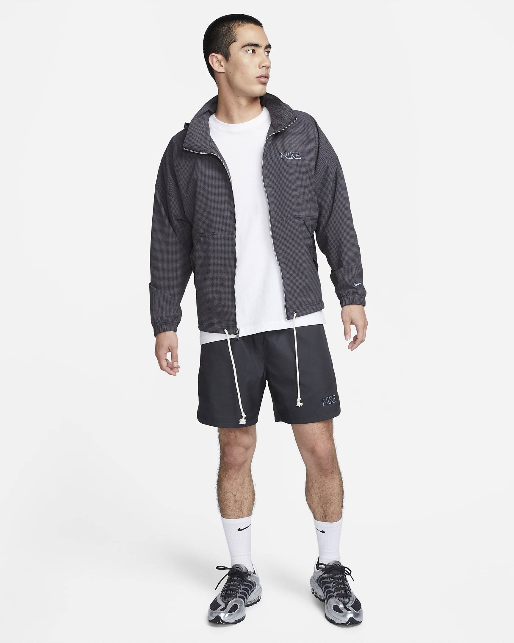 Nike Sportswear Men's Woven Lined Flow Shorts. Nike VN