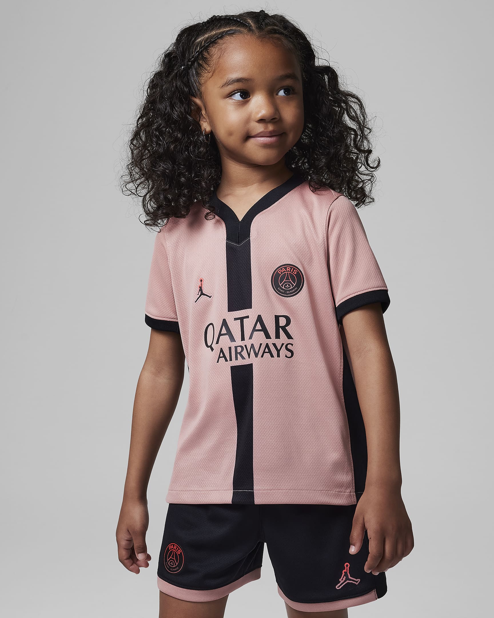 Paris Saint-Germain 2024/25 Stadium Third Younger Kids' Jordan Football Replica Three-Piece Kit - Rust Pink/Black/Black