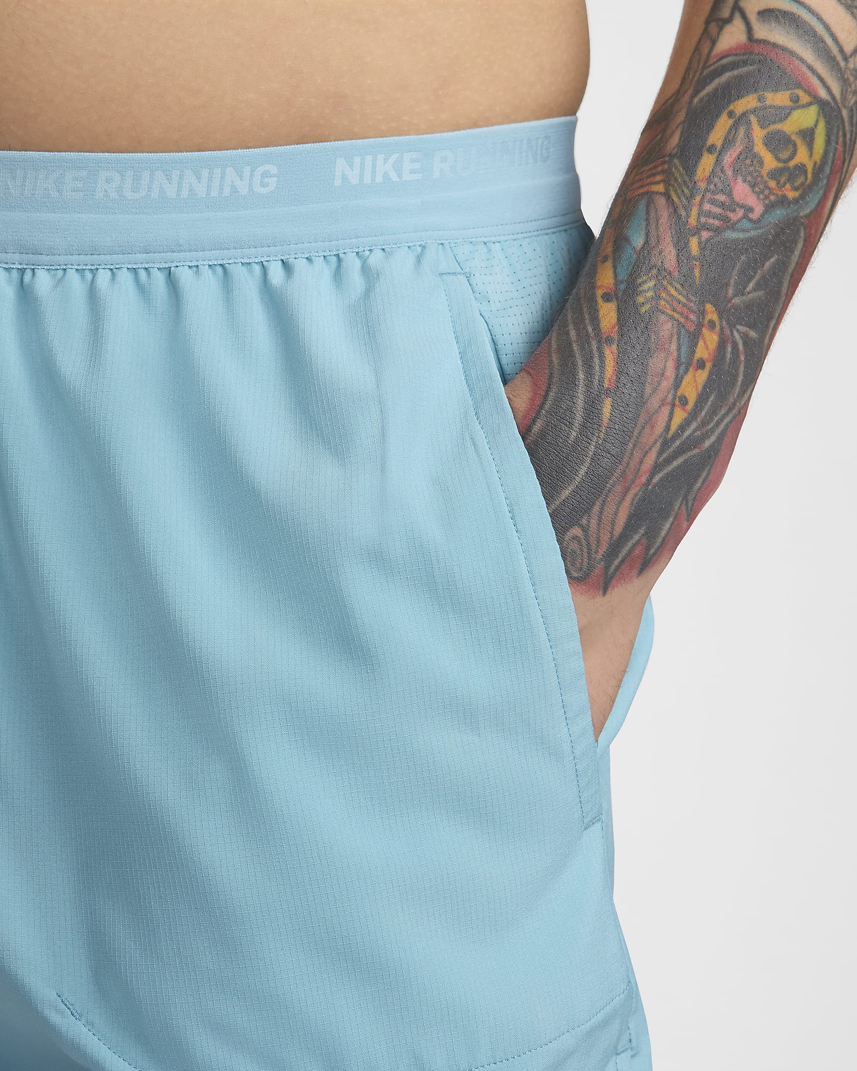 Short de running avec sous-short intégré Dri-FIT Nike Stride 13 cm pour homme - Denim Turquoise/Noir