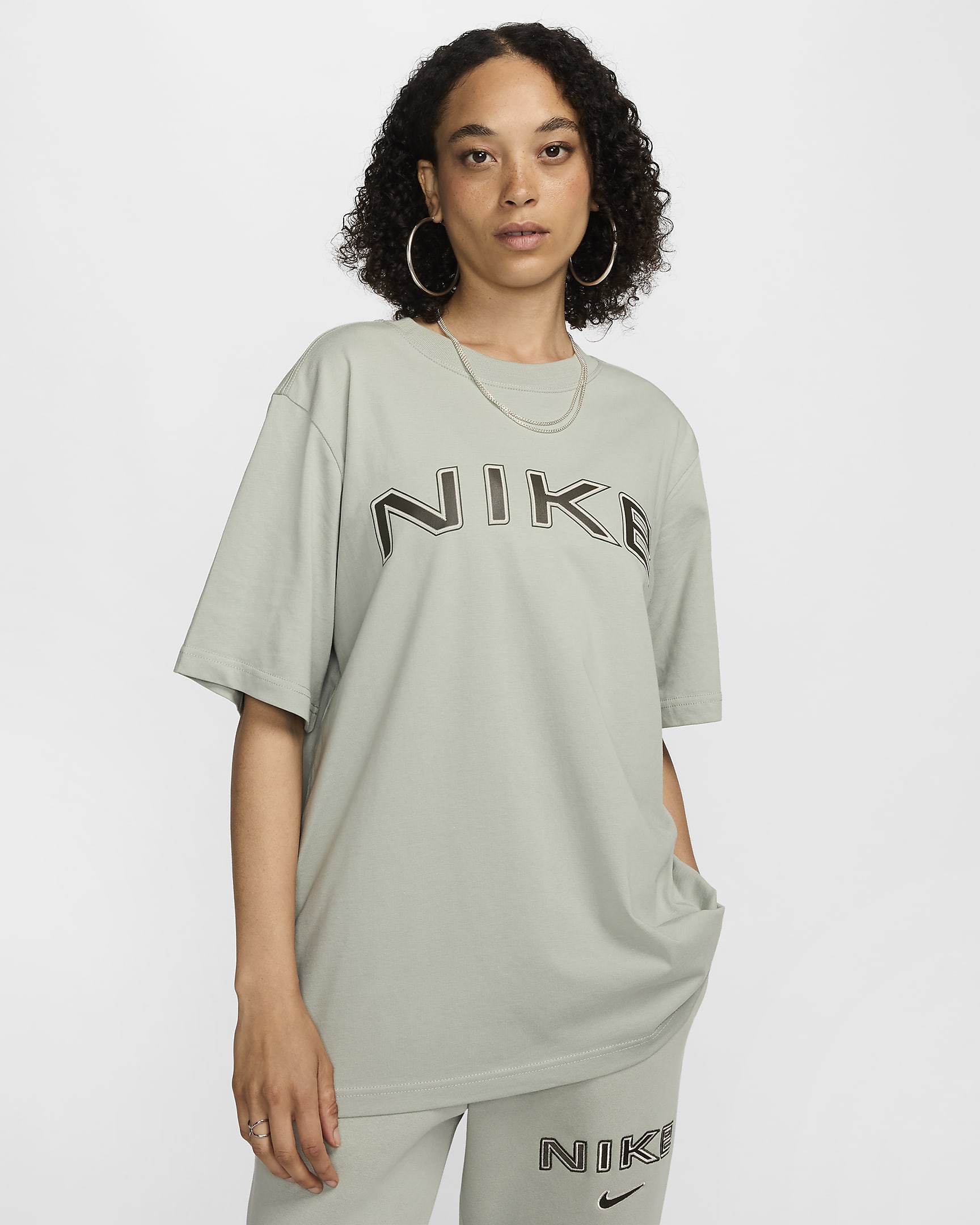 Nike Sportswear weites Kurzarmshirt mit Grafik (Damen) - Jade Horizon