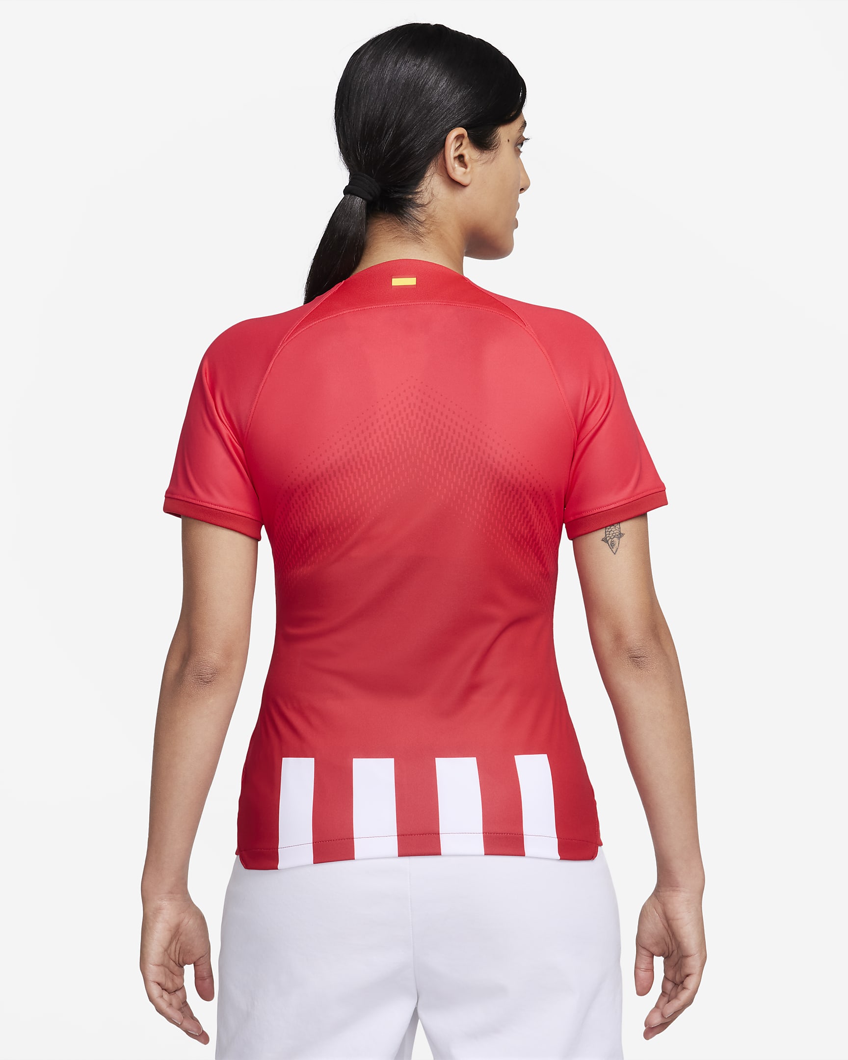 Jersey de fútbol Nike Dri-FIT del Club Atlético de Madrid local 2023/24 Stadium para mujer - Rojo deportivo/Rojo mundial/Blanco/Azul eléctrico