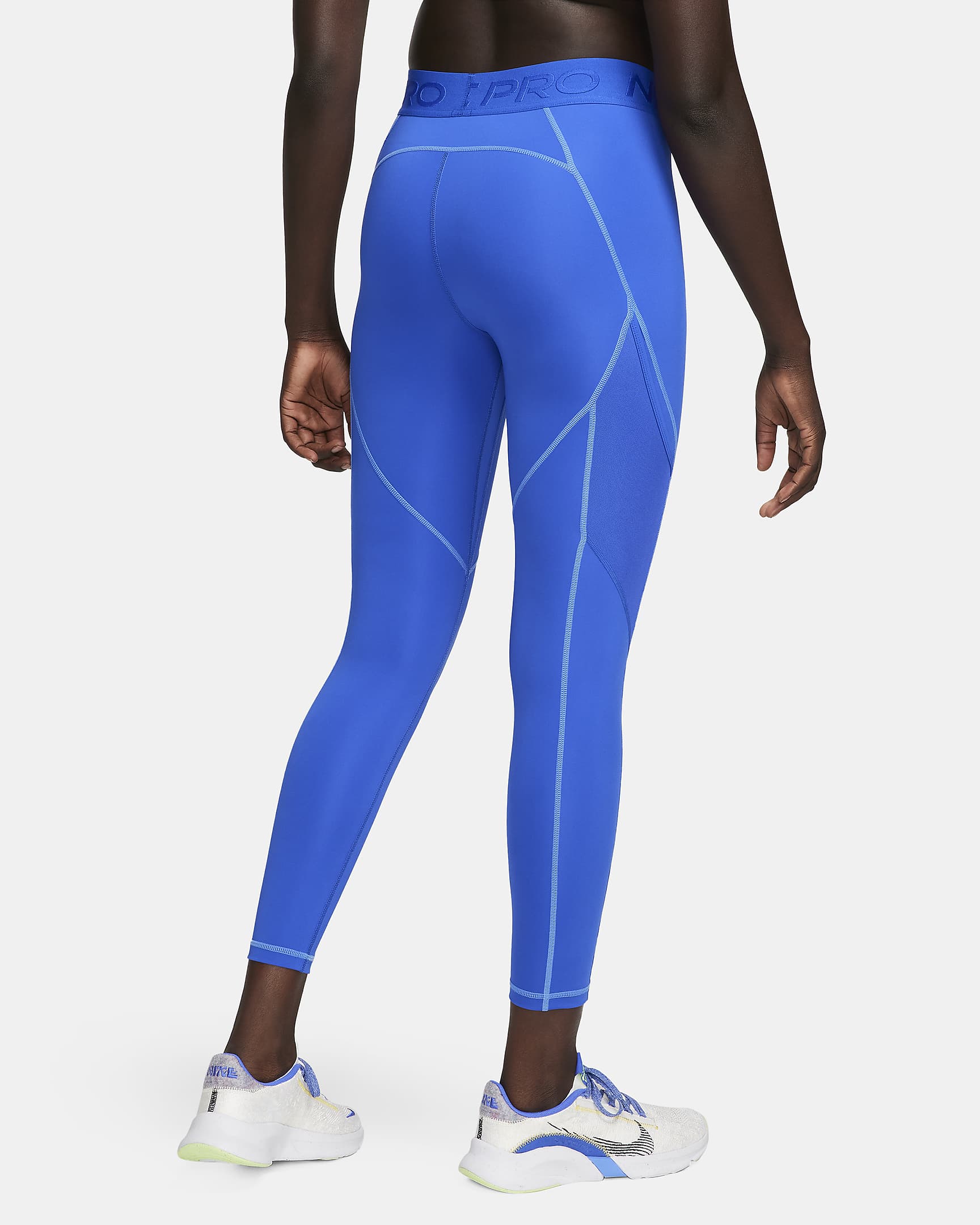 Nike Pro Women's MidRise 7/8 Leggings with Pockets. Nike IE