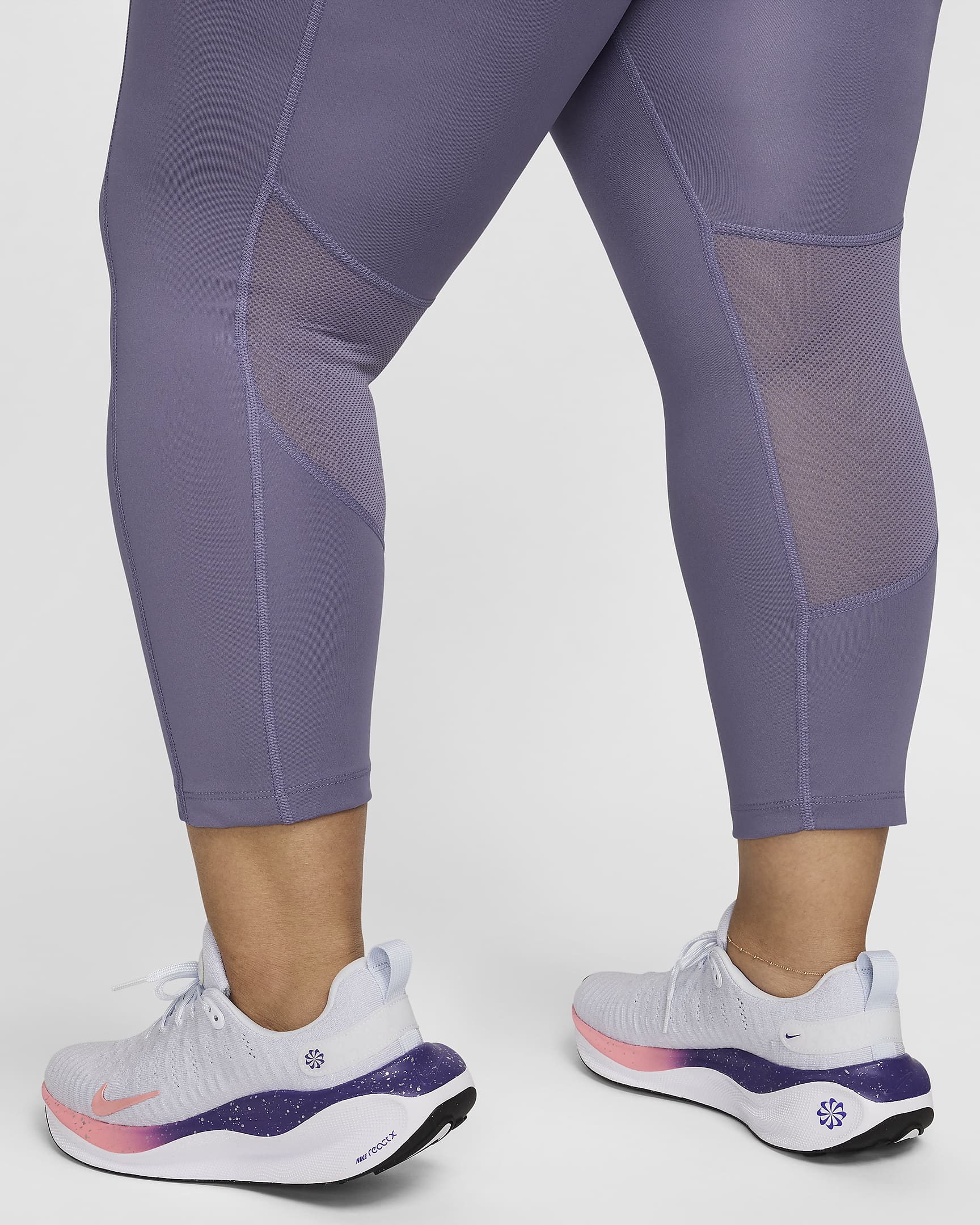 Nike Fast Women's Mid-Rise Crop Running Leggings (Plus Size). Nike BE