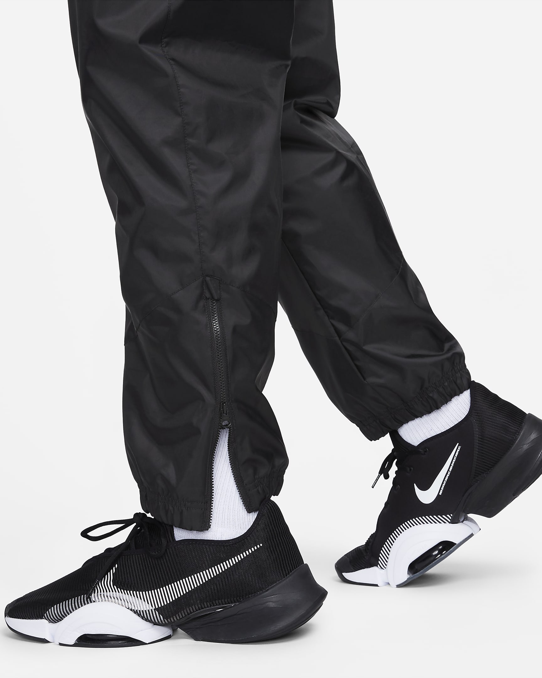 Pants forrados de tejido Woven para hombre Nike Windrunner - Negro/Negro/Blanco