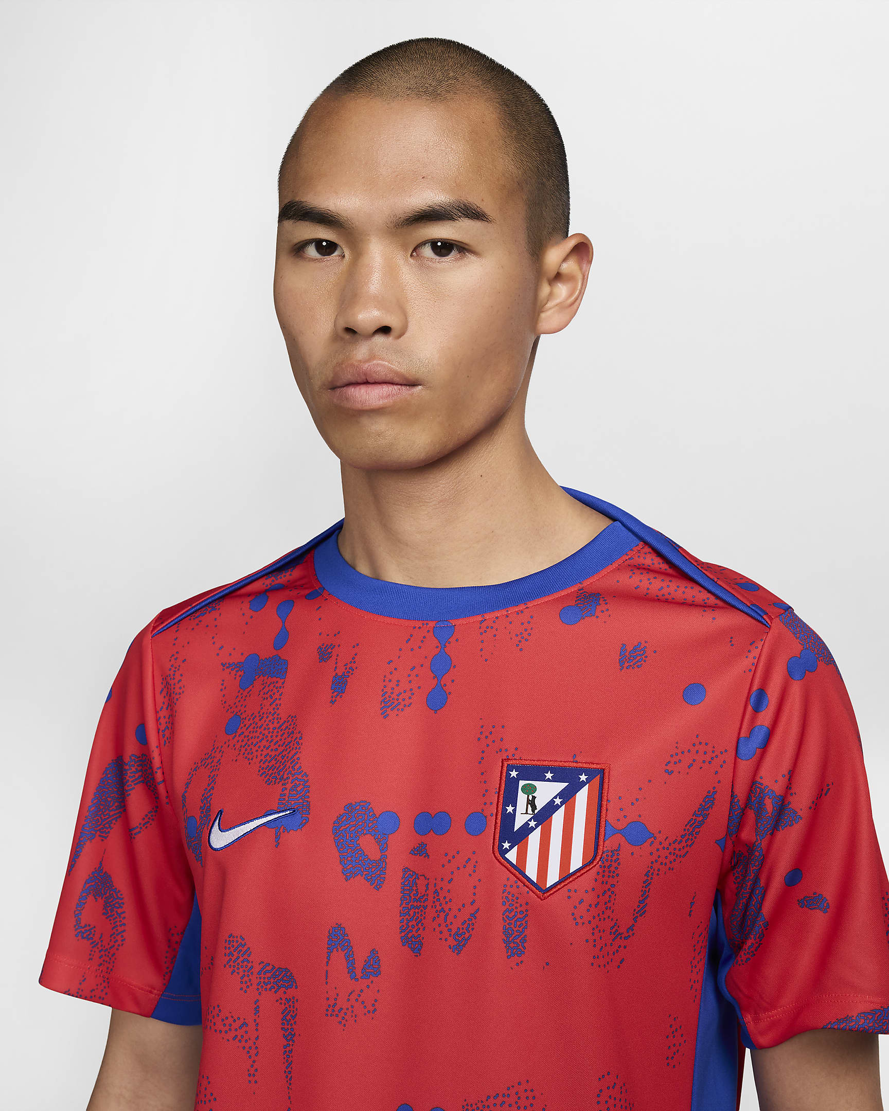 Atlético Madrid Academy Pro Nike Dri-FIT warming-upvoetbaltop met korte mouwen voor heren - Light Crimson/Hyper Royal/Wit