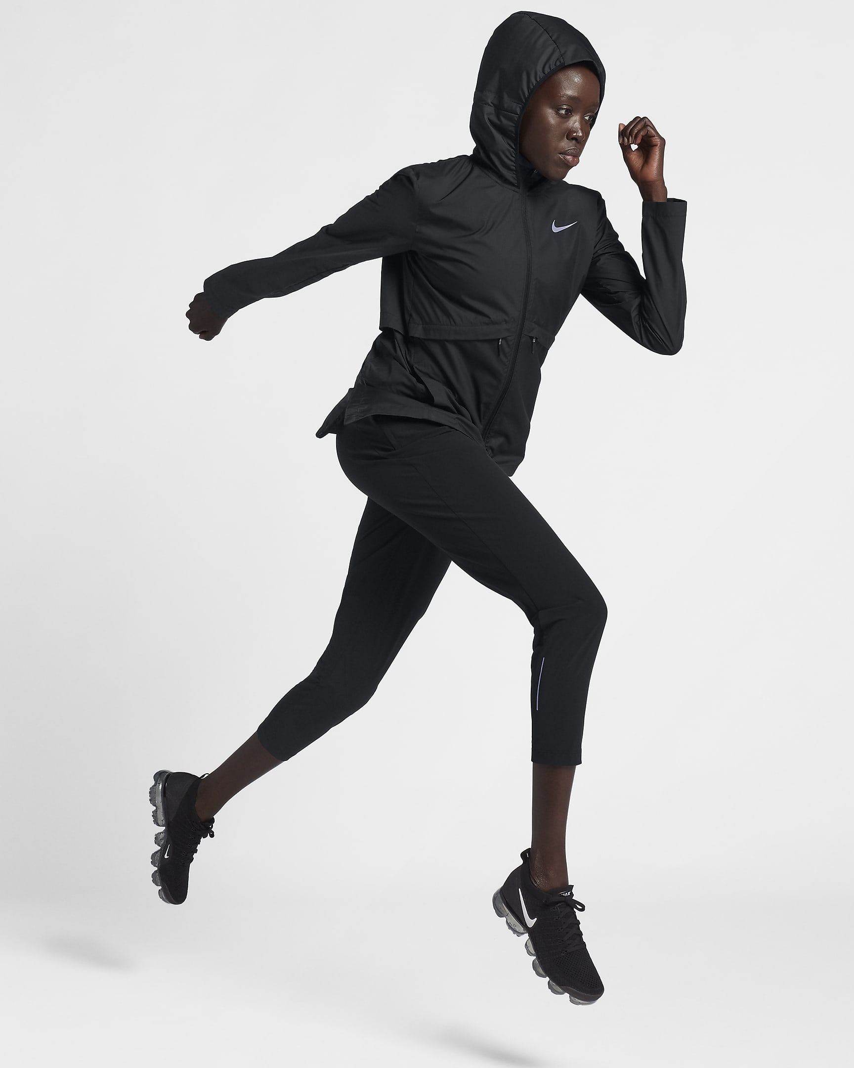 Nike Essential Women's Packable Running Rain Jacket.