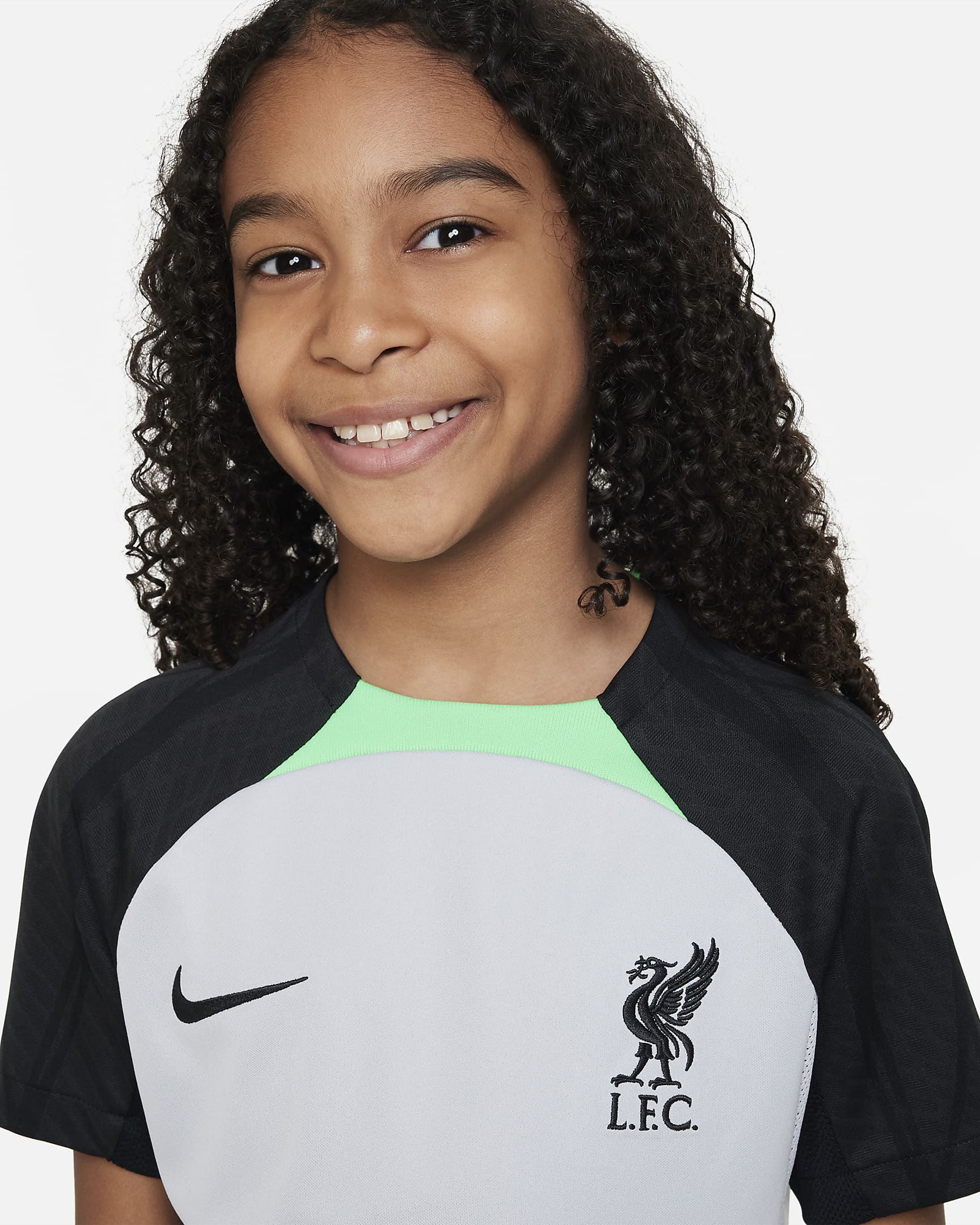 Liverpool F.C. Strike Older Kids' Nike Dri-FIT Knit Football Top. Nike CA