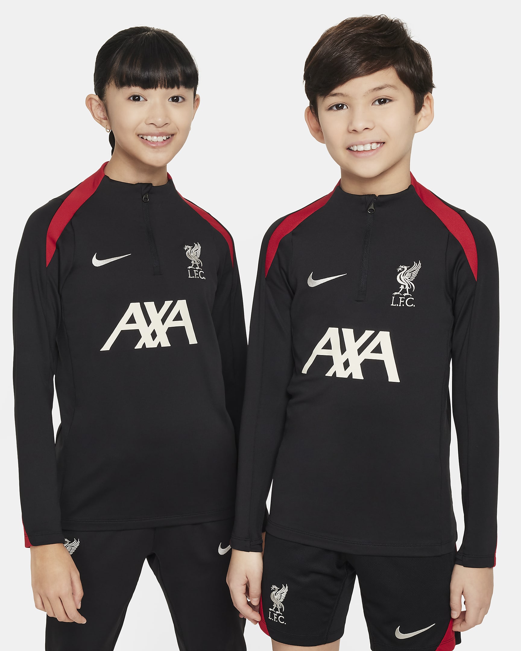 Liverpool FC Strike Nike Dri-FIT-fodboldtræningstrøje til større børn - sort/sort/Gym Red/Light Orewood Brown