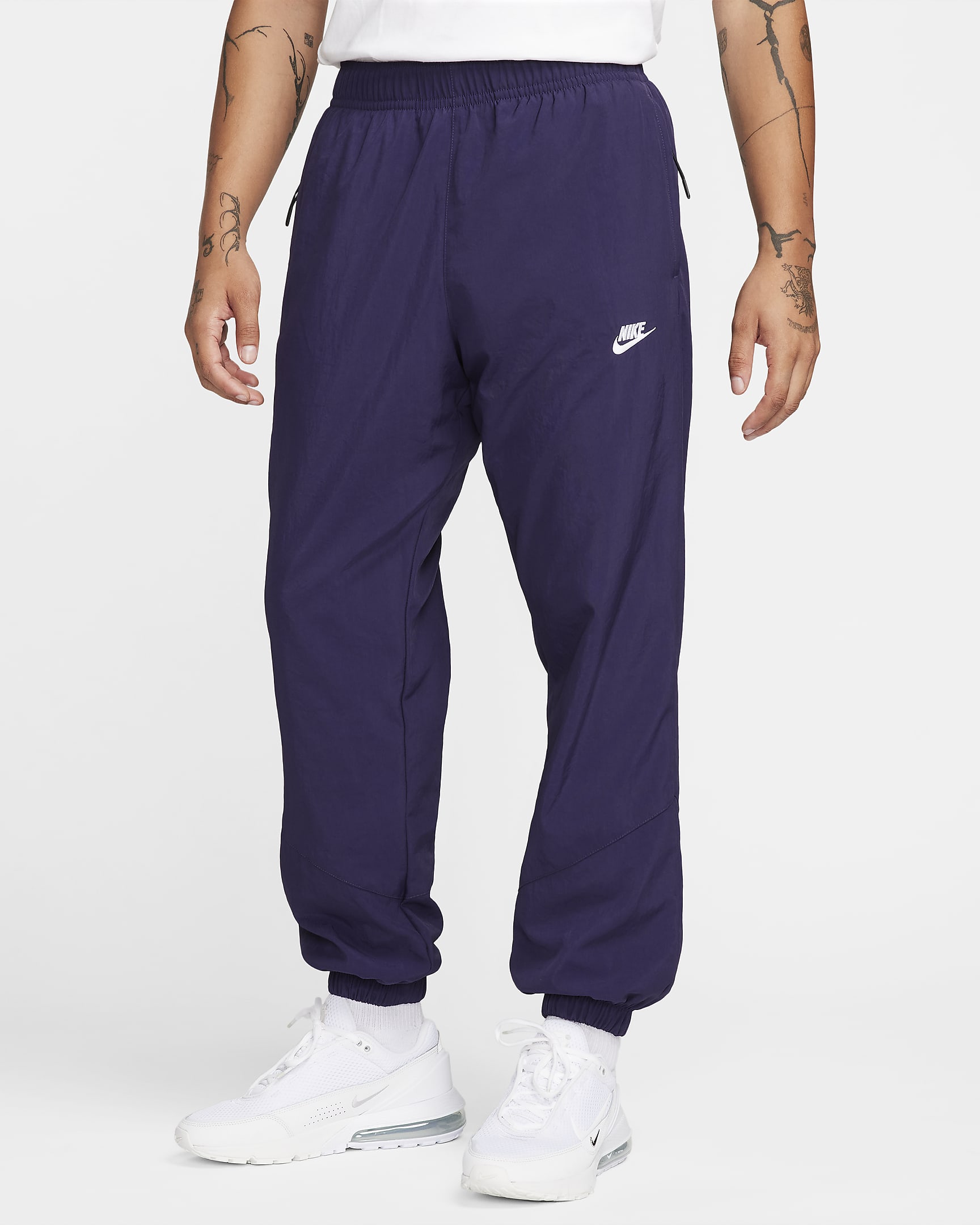 Pantalon d‘hiver tissé Nike Windrunner pour homme - Purple Ink/Blanc