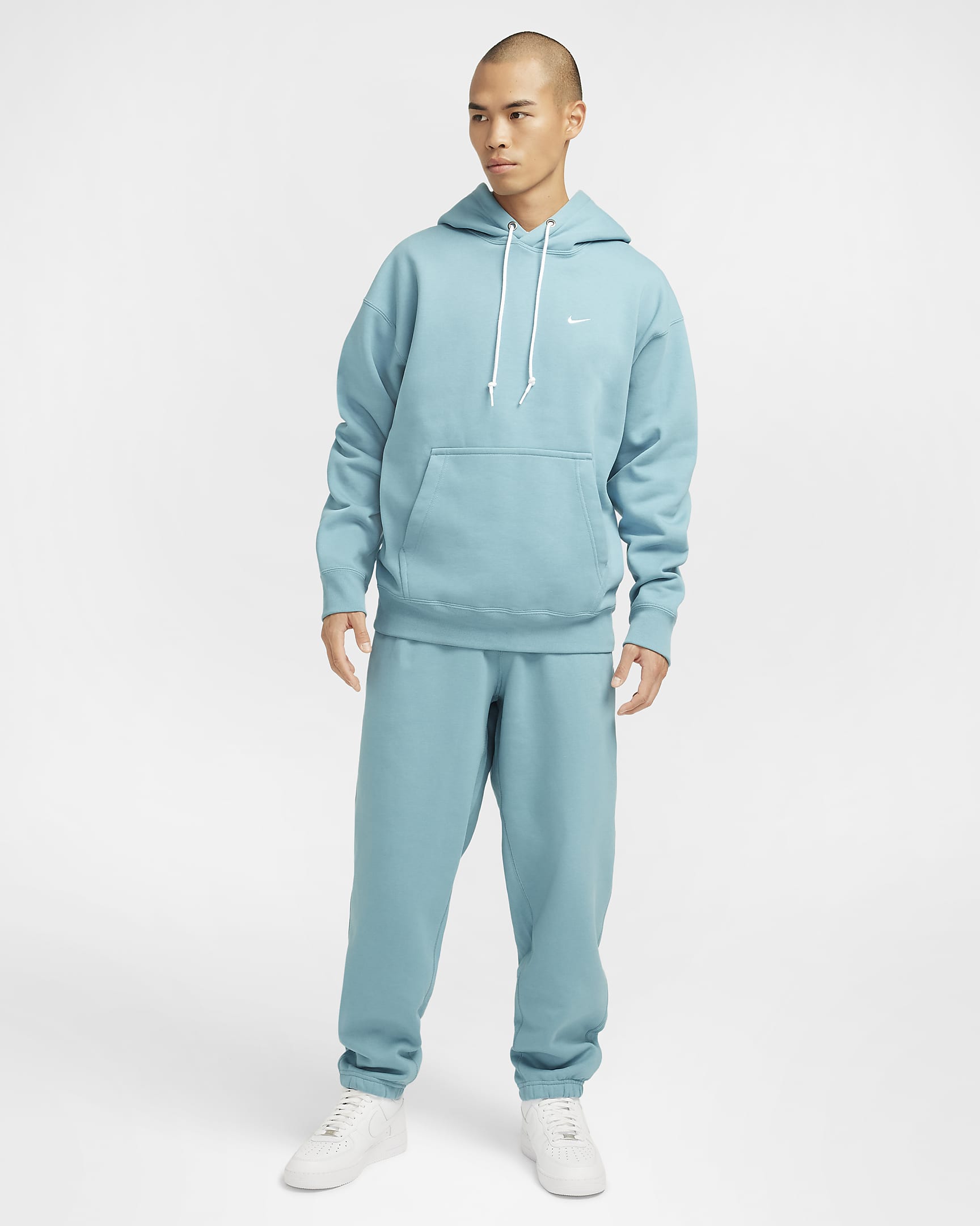 Pantaloni in fleece Nike Solo Swoosh - Uomo - Denim Turquoise/Bianco