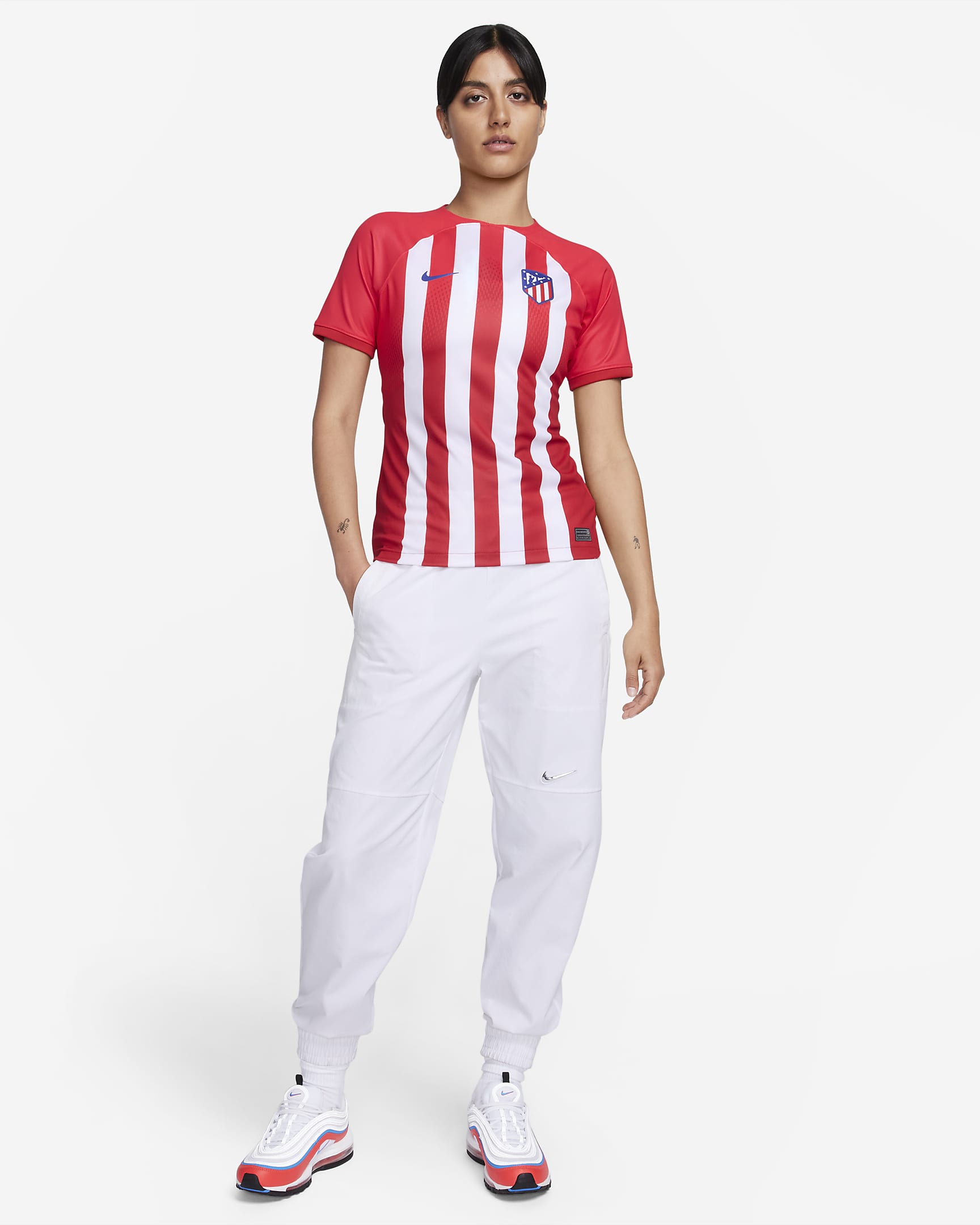 Jersey de fútbol Nike Dri-FIT del Club Atlético de Madrid local 2023/24 Stadium para mujer - Rojo deportivo/Rojo mundial/Blanco/Azul eléctrico