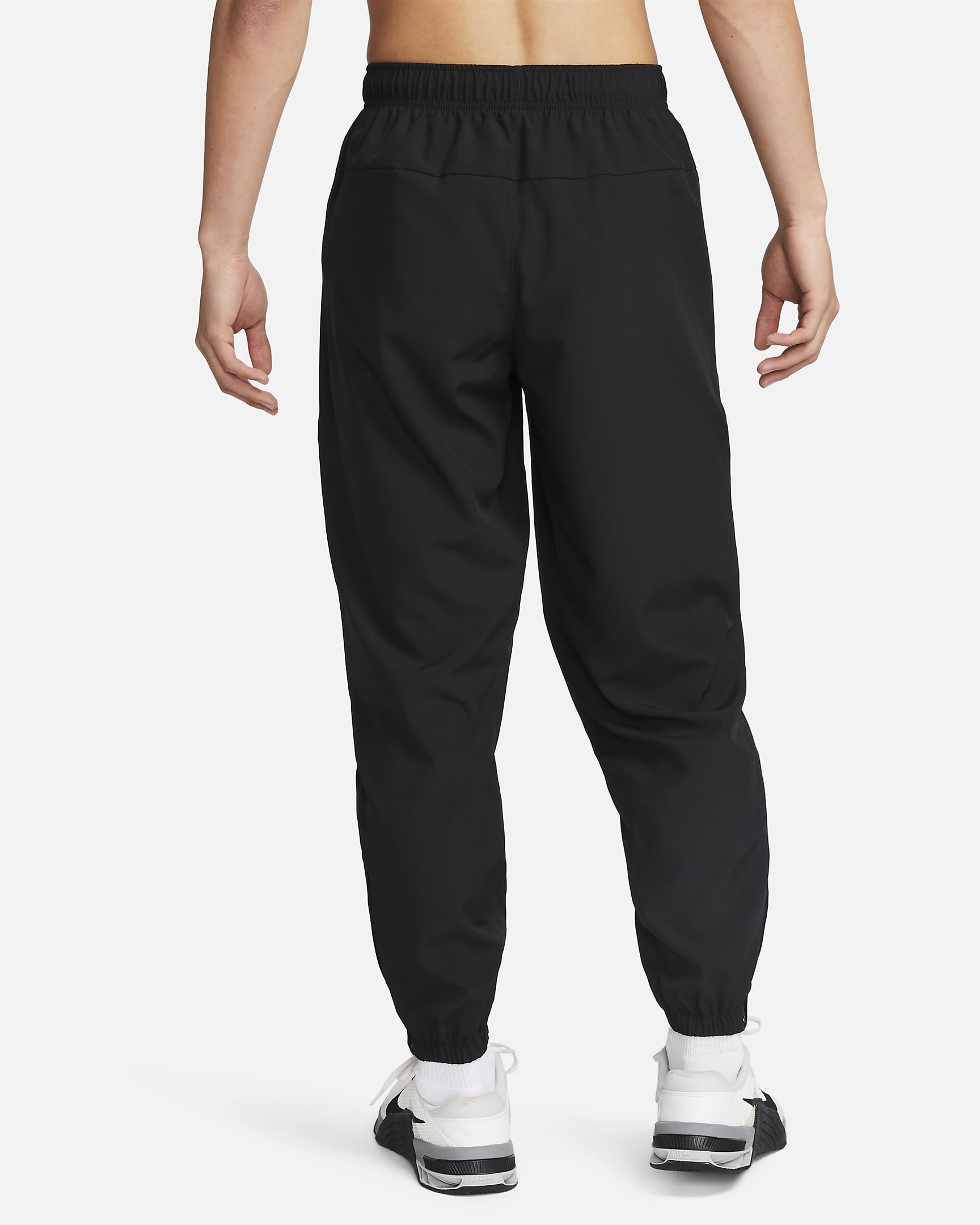 Nike Form Men's DriFIT Tapered Versatile Trousers. Nike IL