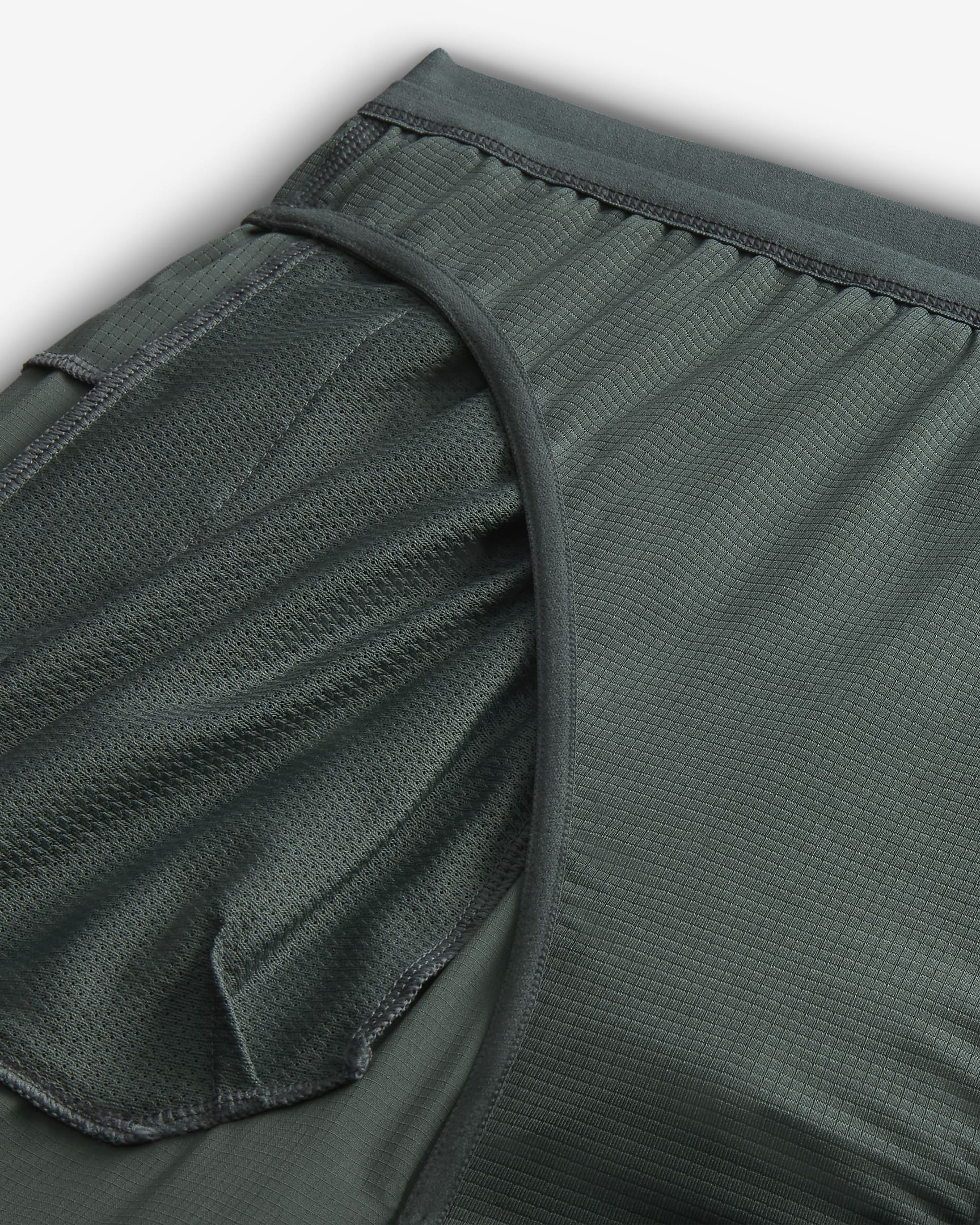 Shorts de correr Dri-FIT de 18 cm con forro de ropa interior para hombre Nike Stride - Verde vintage/Negro