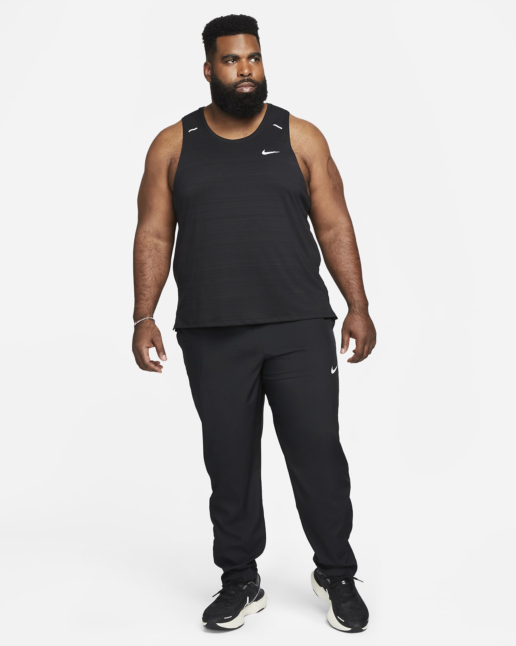 Nike Men's Woven Running Trousers. Nike FI