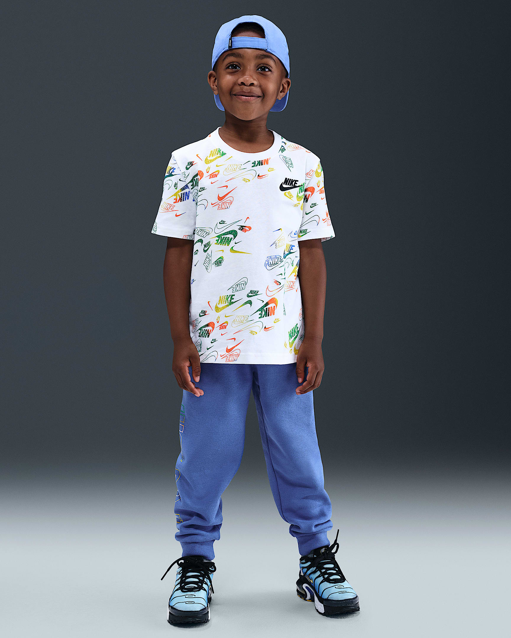 Conjunto de playera y pants Reveal estampado para niños talla pequeña Nike Sportswear - Azul cometa