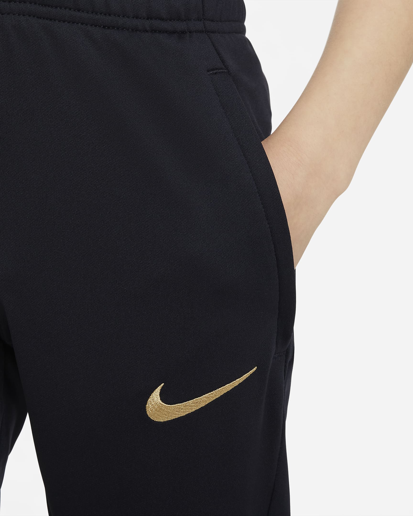 Chelsea F.C. Strike Older Kids' Nike DriFIT Knit Football Pants. Nike CA