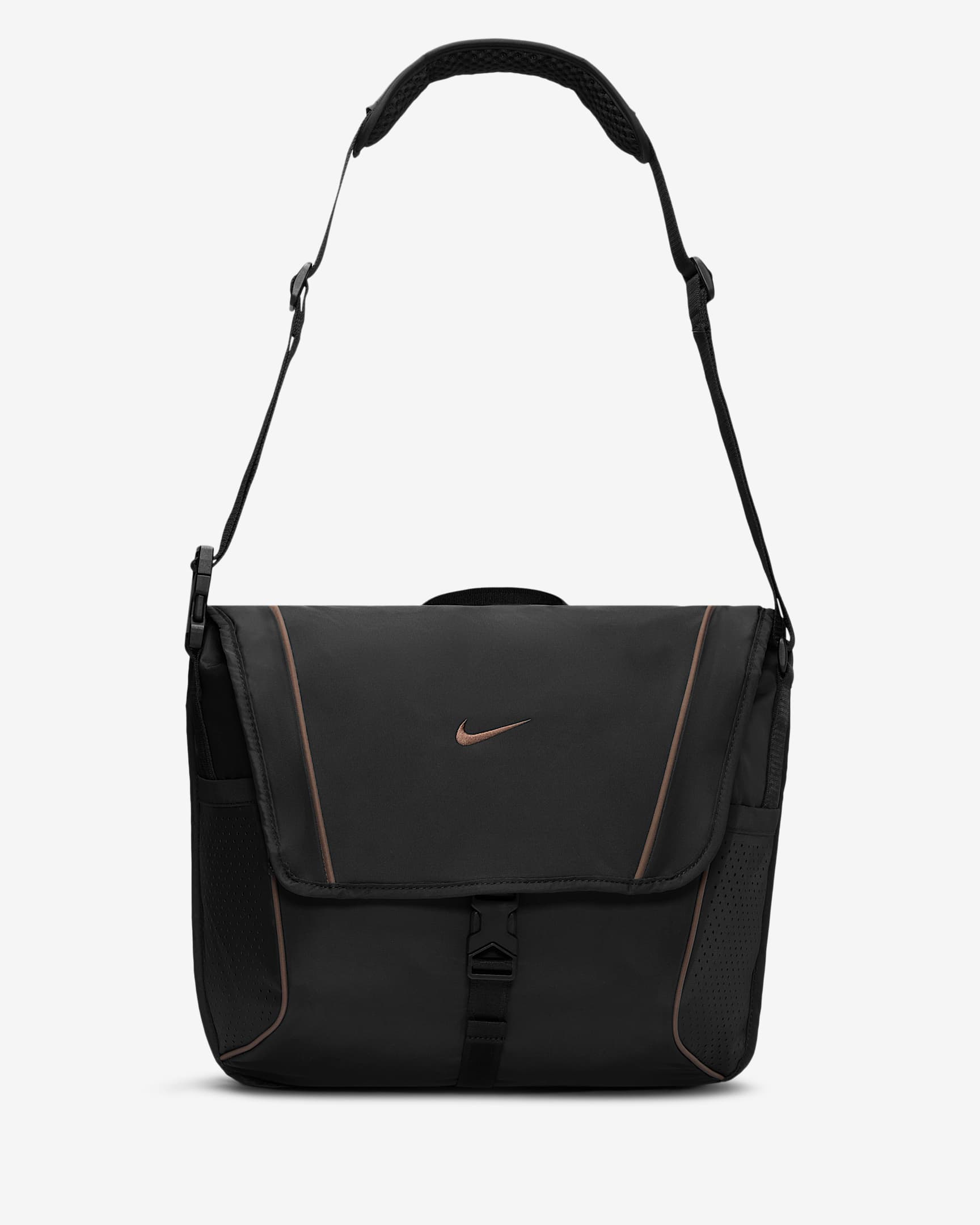 Nike Sportswear Essentials Messenger Bag (15L). Nike ID