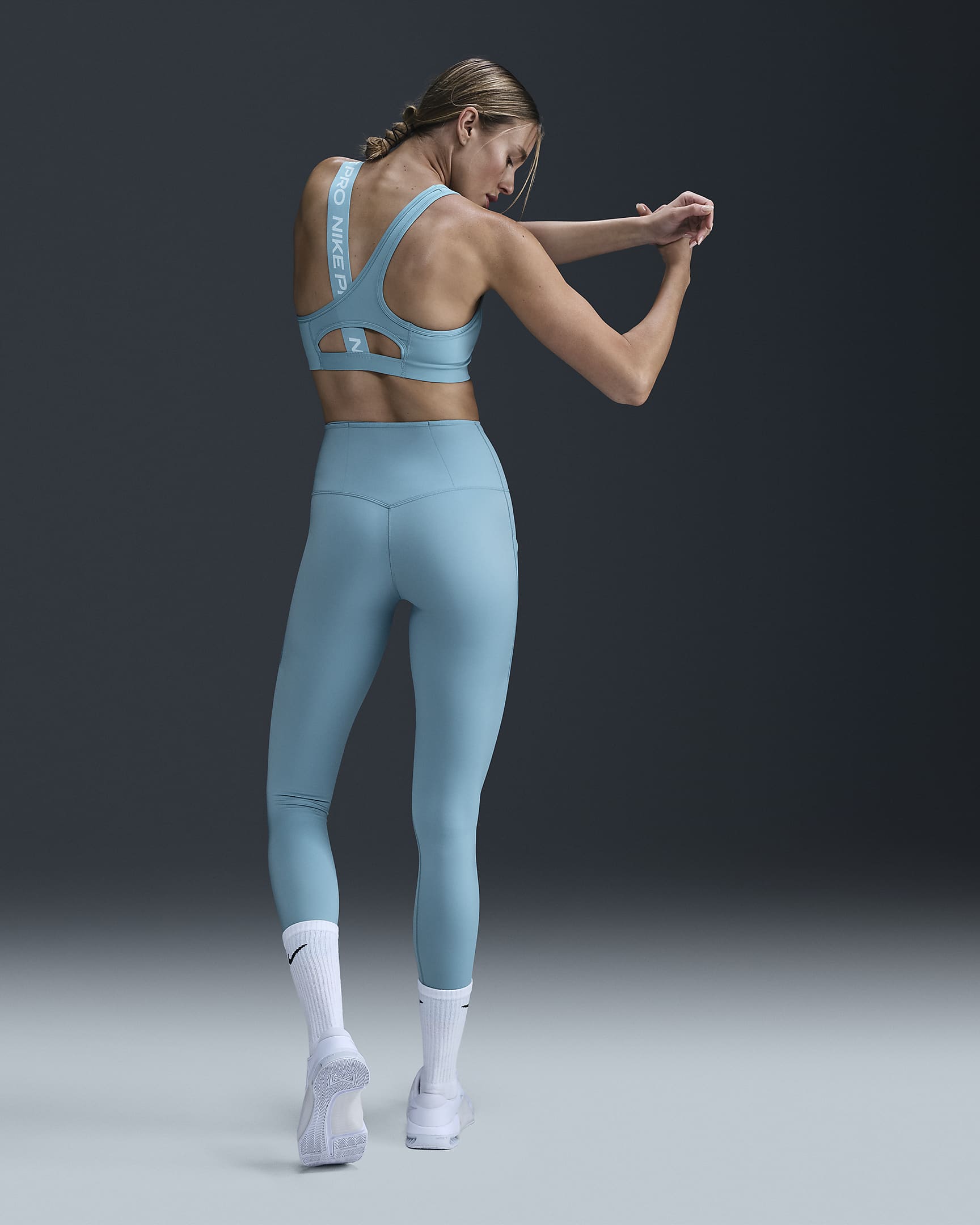 Nike Go Leggings de 7/8 de sujeción firme con bolsillos - Mujer - Denim Turquoise/Negro