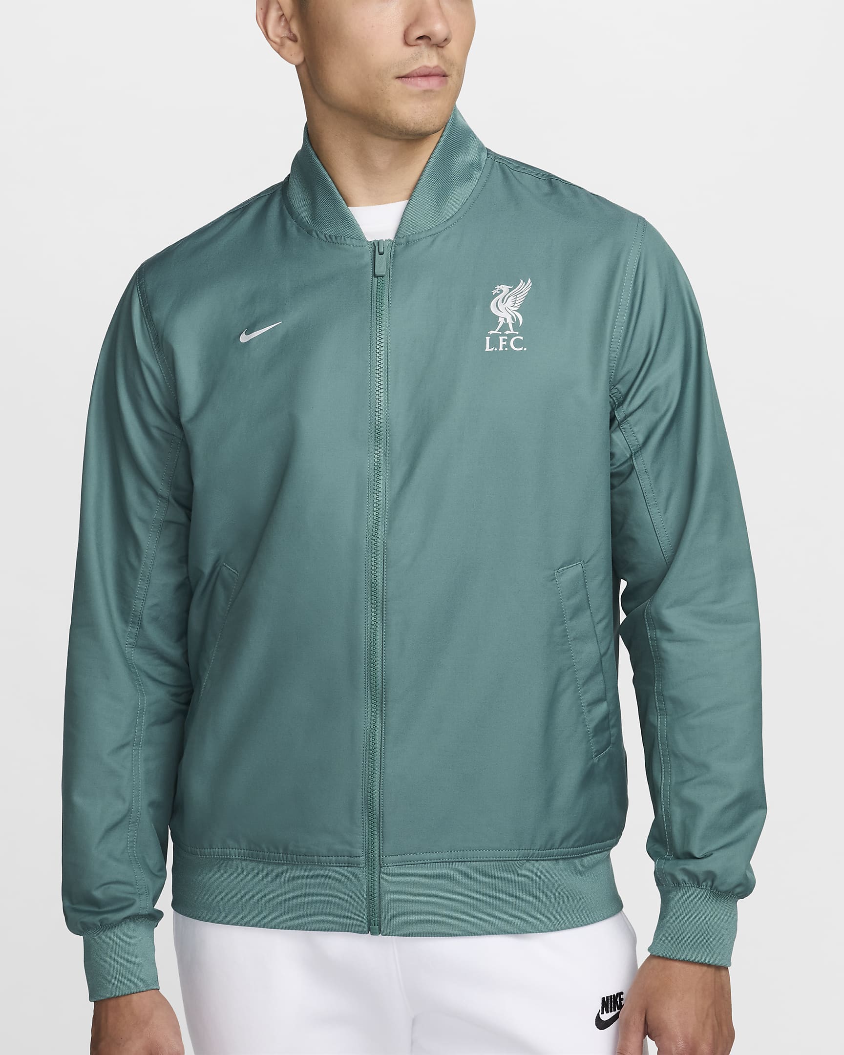 Męska kurtka piłkarska typu bomberka z tkaniny bez podszewki Nike Liverpool F.C. Sport Essentials - Bicoastal/Metallic Silver