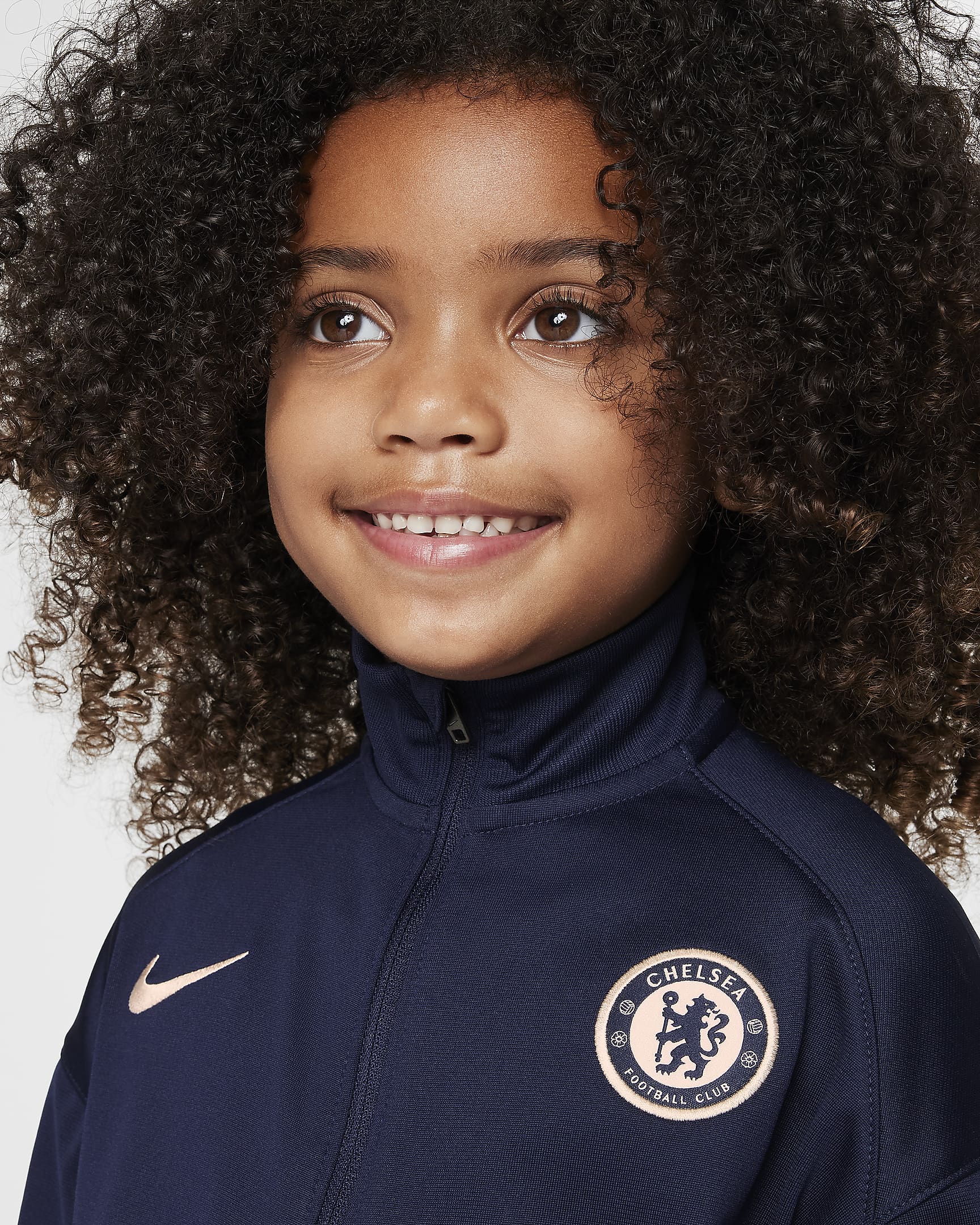 Chelsea F.C. Strike Younger Kids' Nike Dri-FIT Football Knit Tracksuit - Obsidian/Light Photo Blue/Guava Ice