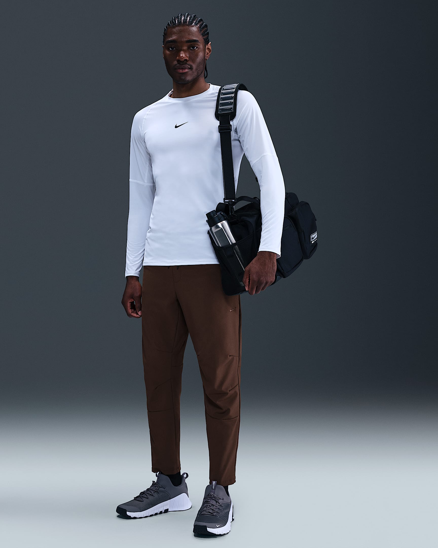 Pants versátiles Dri-FIT de pierna entallada para hombre Nike Unlimited - Marrón barroco/Negro/Marrón barroco