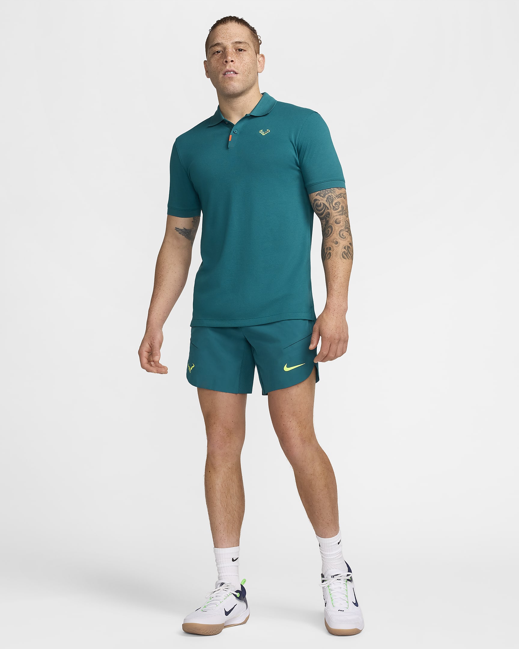 The Nike Polo Rafa Herren-Poloshirt in schmaler Passform - Geode Teal/Volt