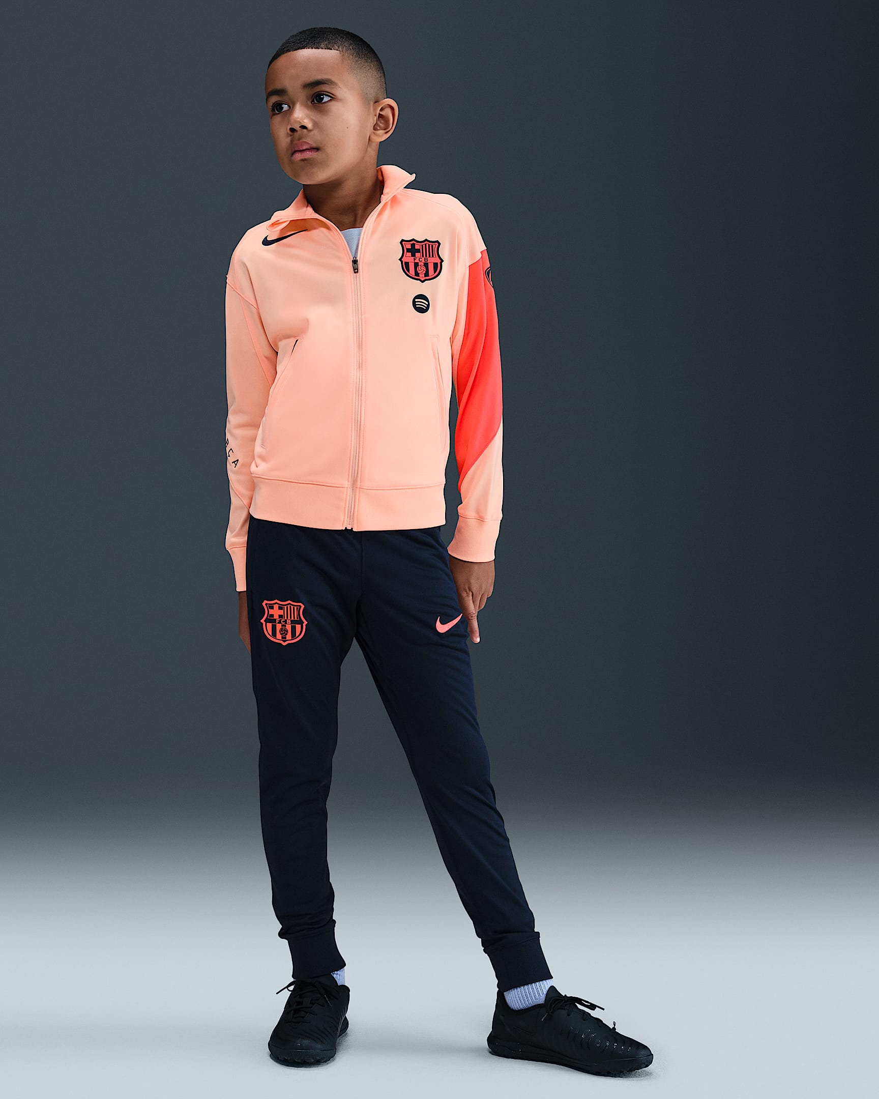 F.C. Barcelona Strike Third Older Kids' Nike Dri-FIT Total 90 Football Knit Tracksuit - Crimson Tint/Midnight Navy/Bright Mango/Midnight Navy