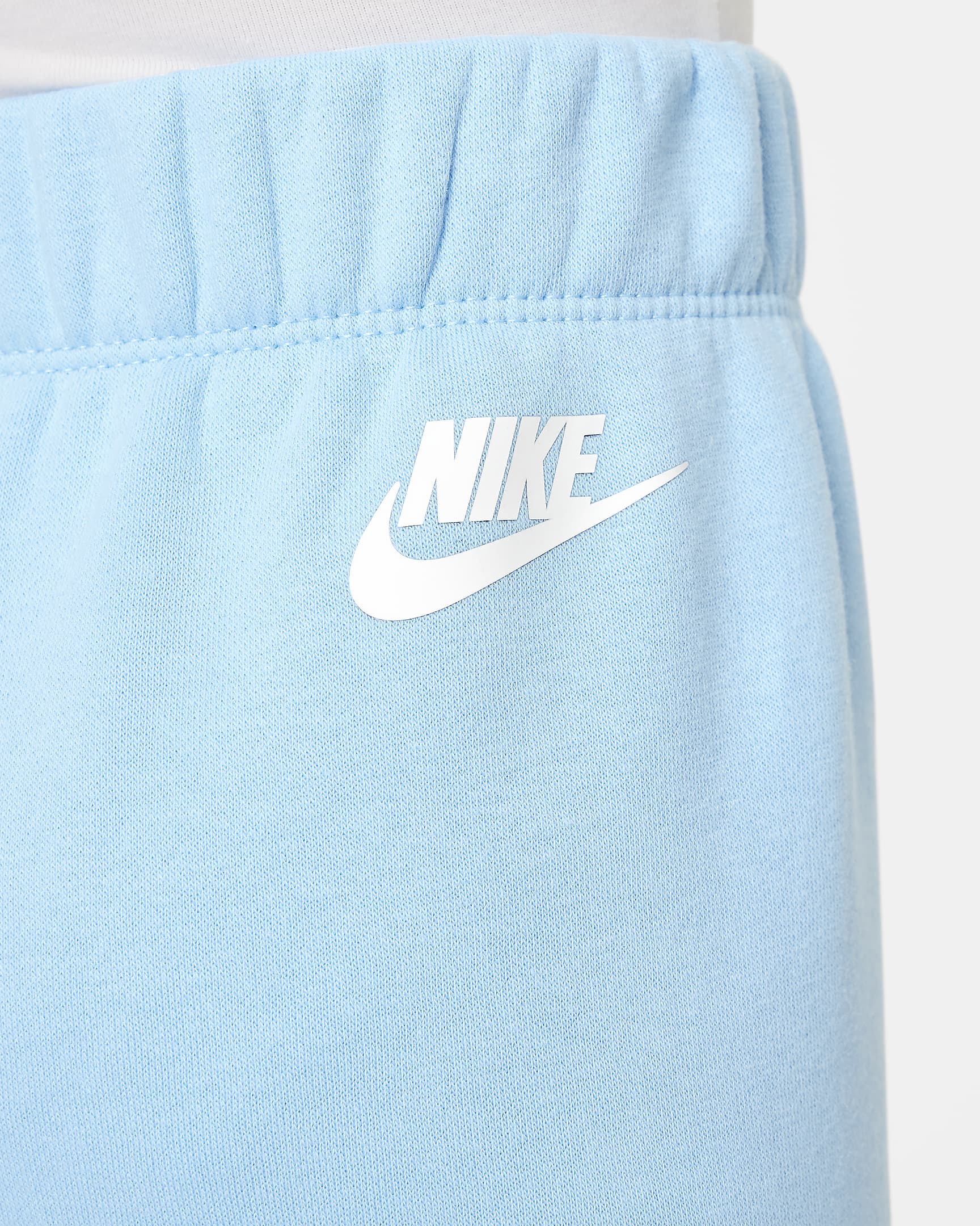 Pants de pierna ancha para niños talla pequeña Nike Floral Fleece.