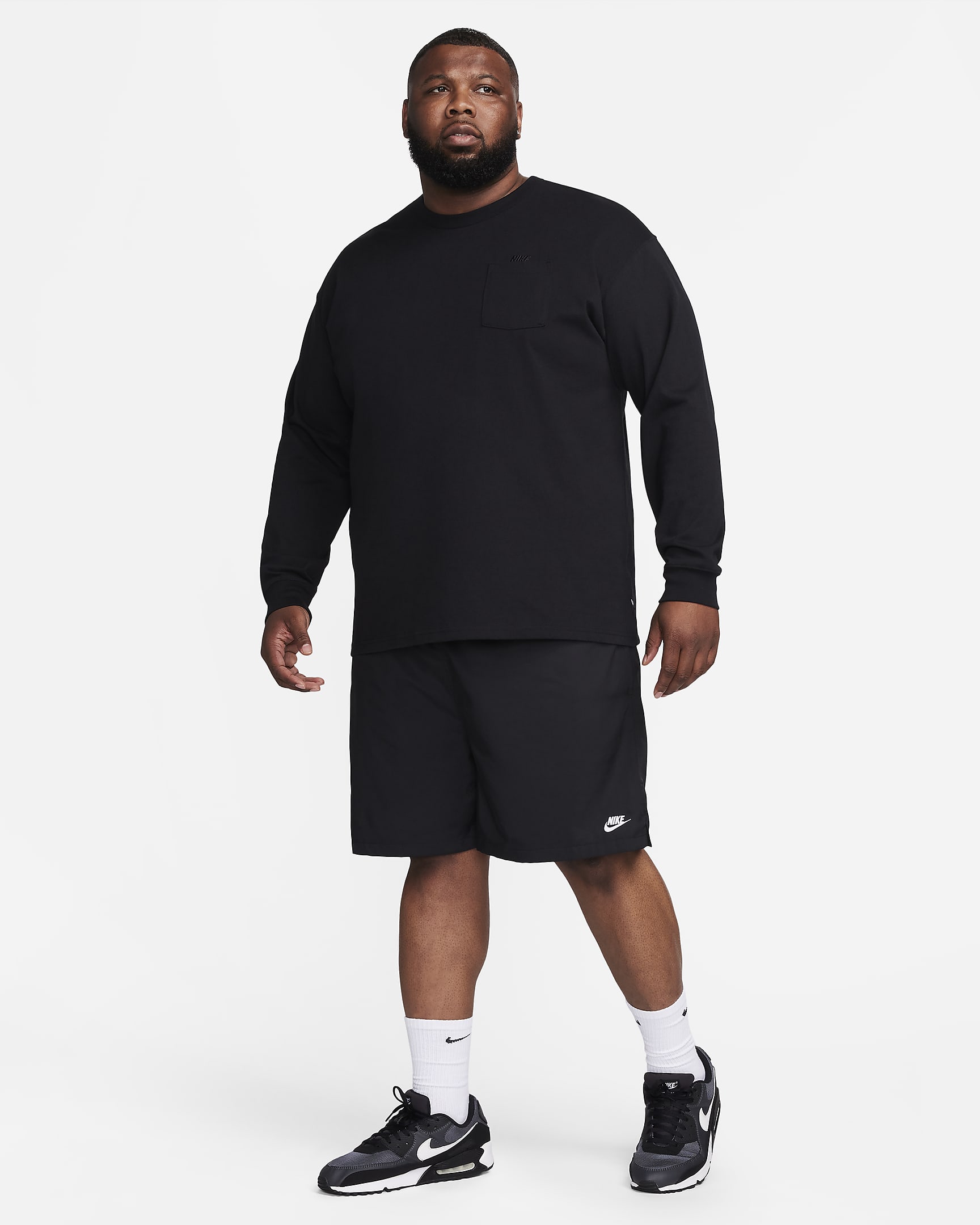 Shorts Flow in tessuto Nike Club – Uomo - Nero/Bianco