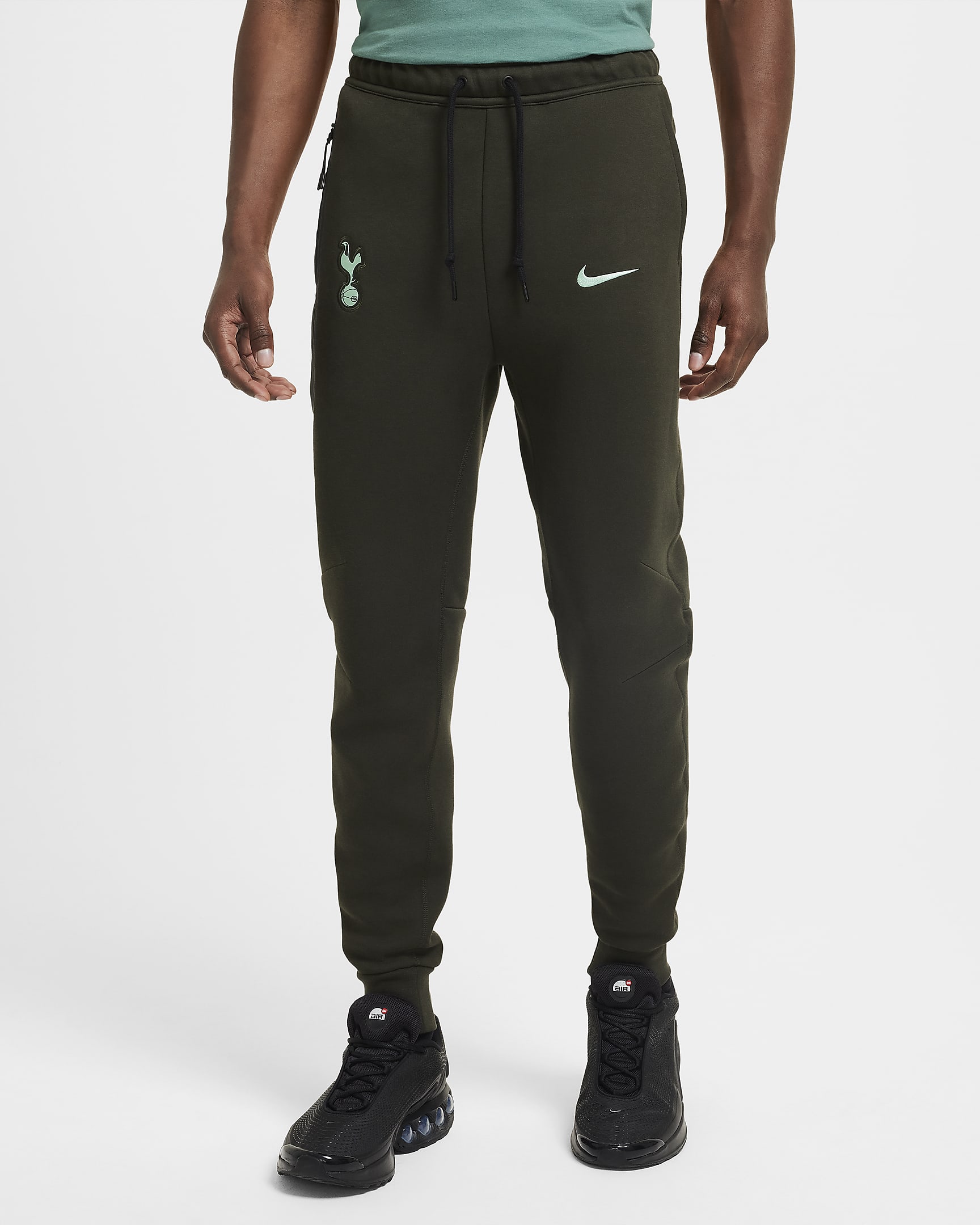 Męskie joggery piłkarskie Nike Tottenham Hotspur Tech Fleece (wersja trzecia) - Sequoia/Enamel Green