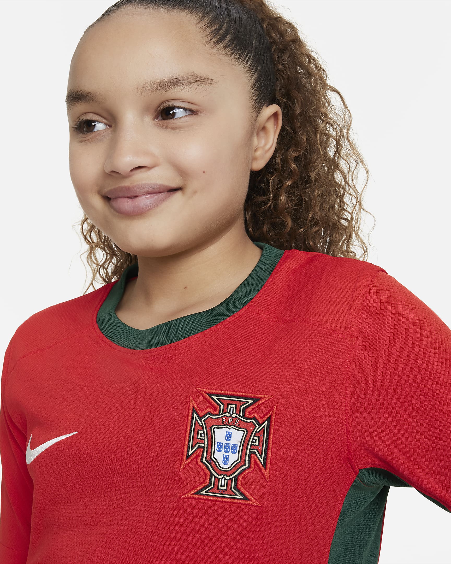 Portugal 2023 Stadium Home Older Kids' Nike Dri-FIT Football Shirt. Nike SE