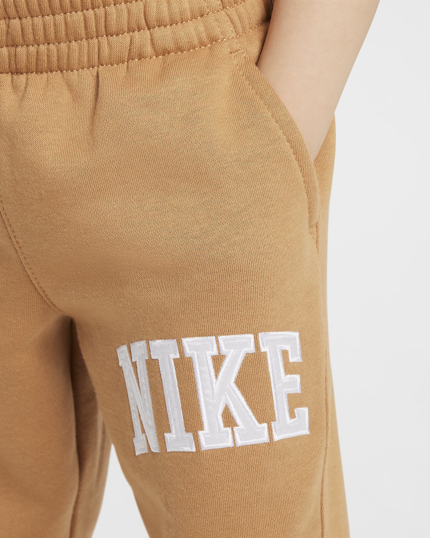 Pants de tejido Fleece con apliques infantil Nike Sportswear Club  - Lino