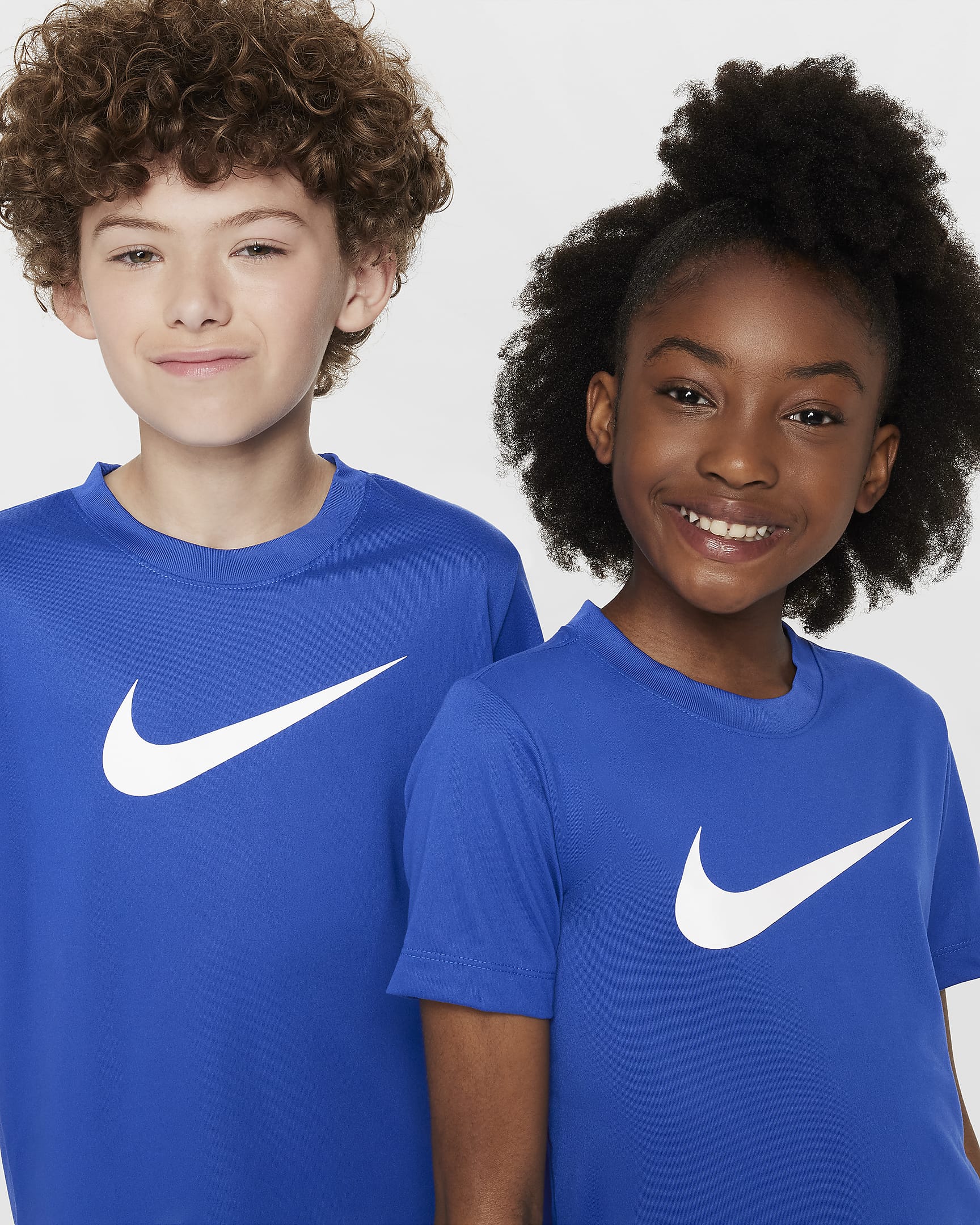 Playera Dri-FIT para niños talla grande Nike Legend - Royal juego