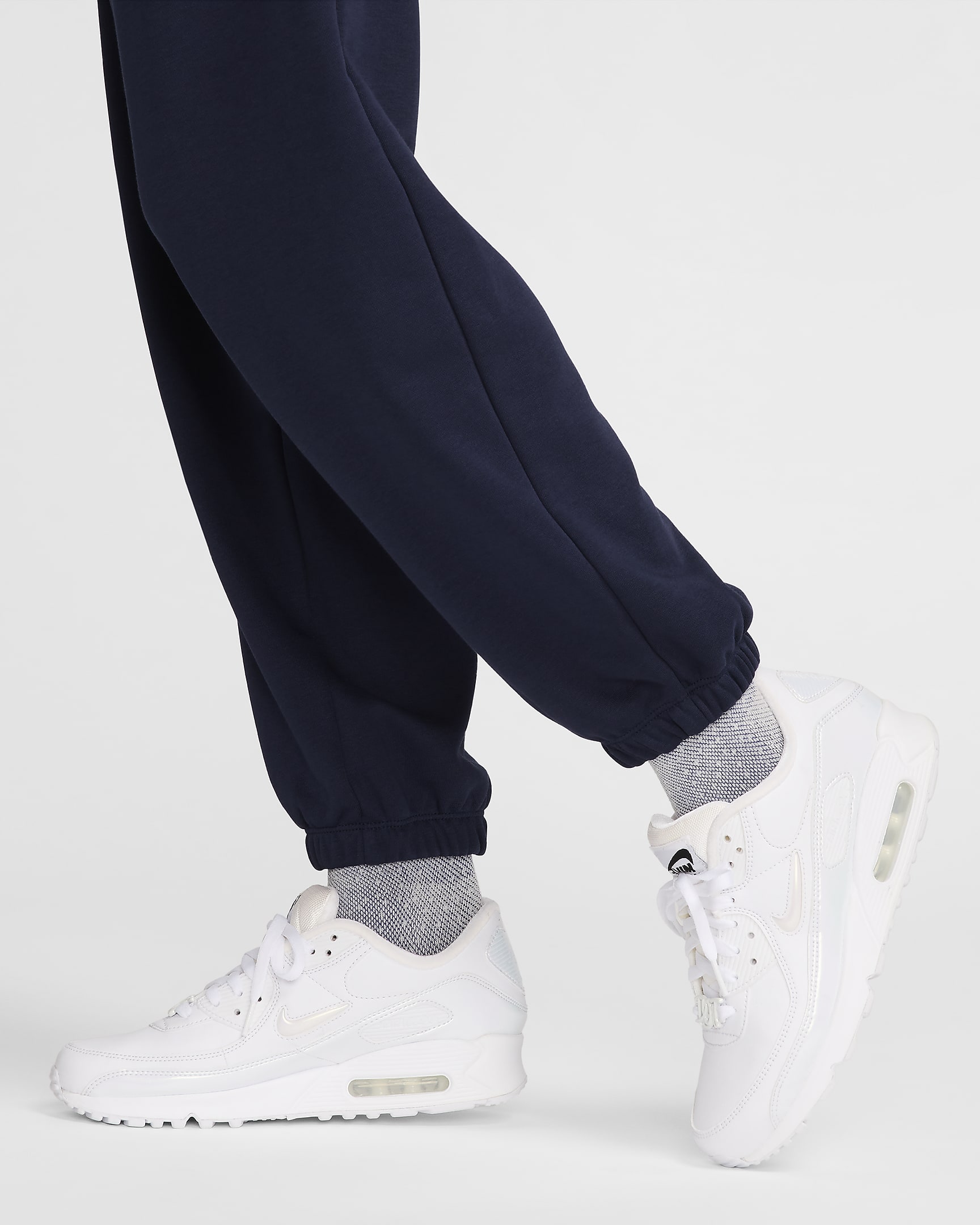 Pants de entrenamiento oversized de tiro medio para mujer Nike Sportswear Club Fleece - Obsidiana/Blanco