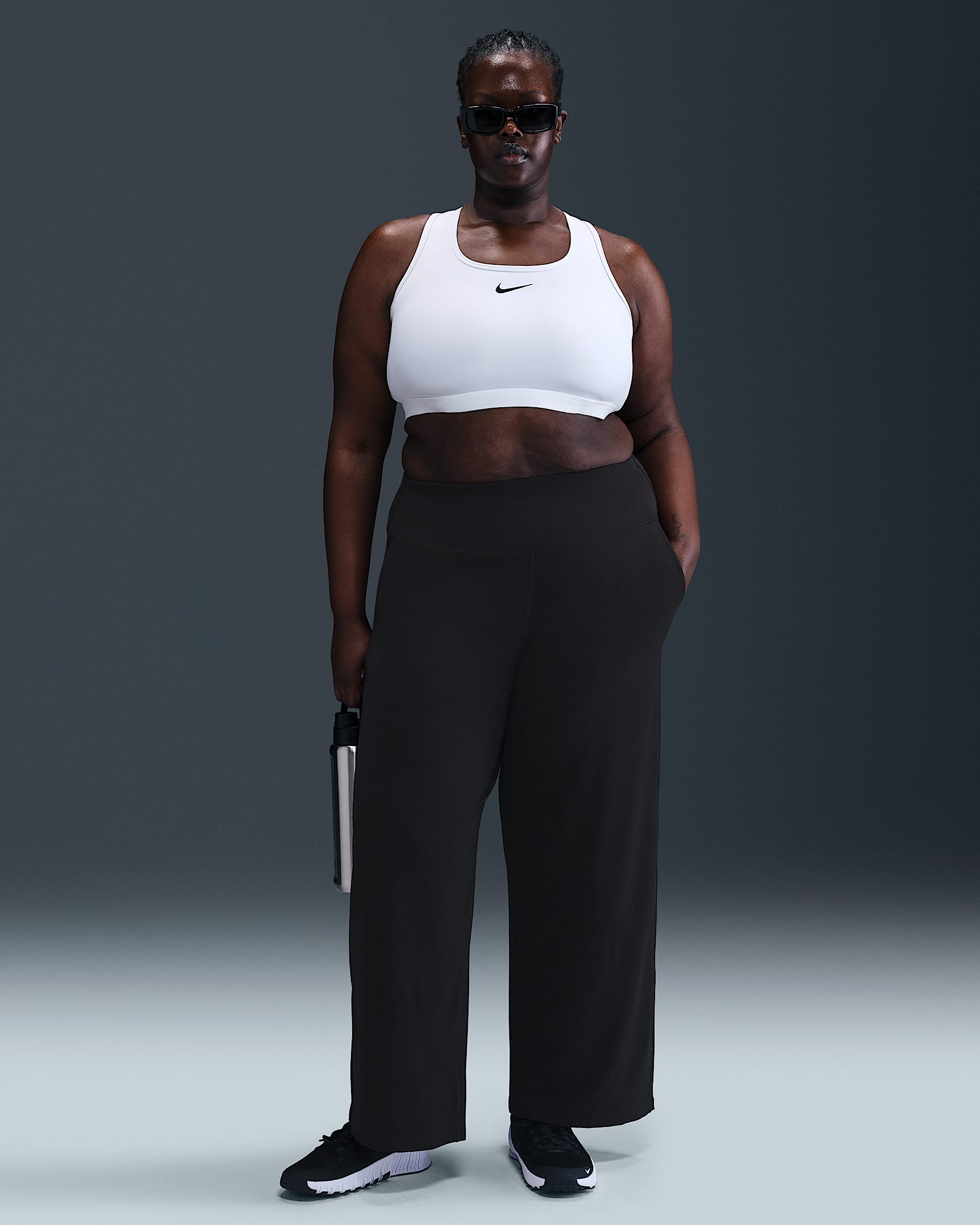 Pants Dri-FIT de tiro alto de pierna amplia para mujer (talla grande) Nike Zenvy - Negro/Negro