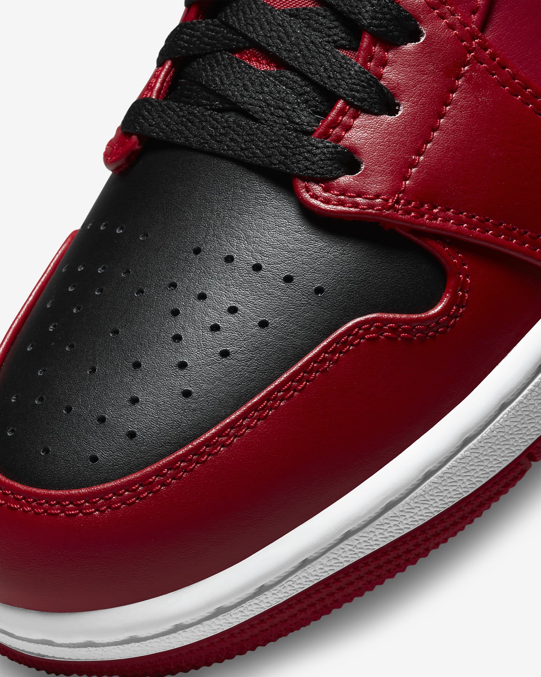 Air Jordan 1 Mid Shoes. Nike AT