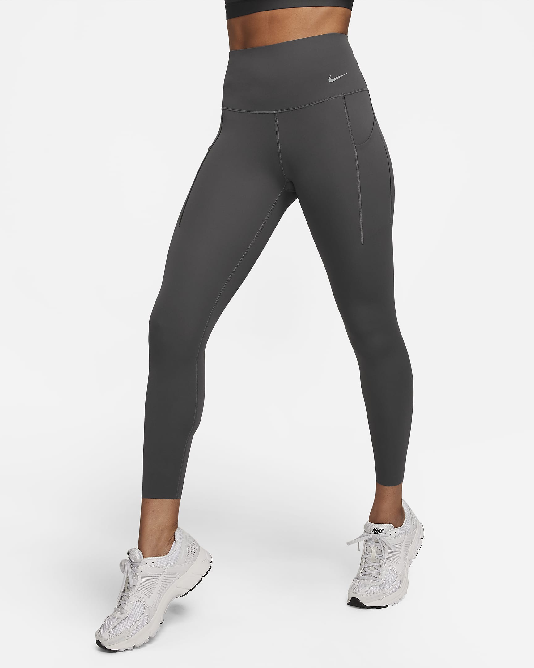 Leggings de 7/8 de tiro alto y sujeción media con bolsillos para mujer Nike Universa - Ceniza medio/Negro