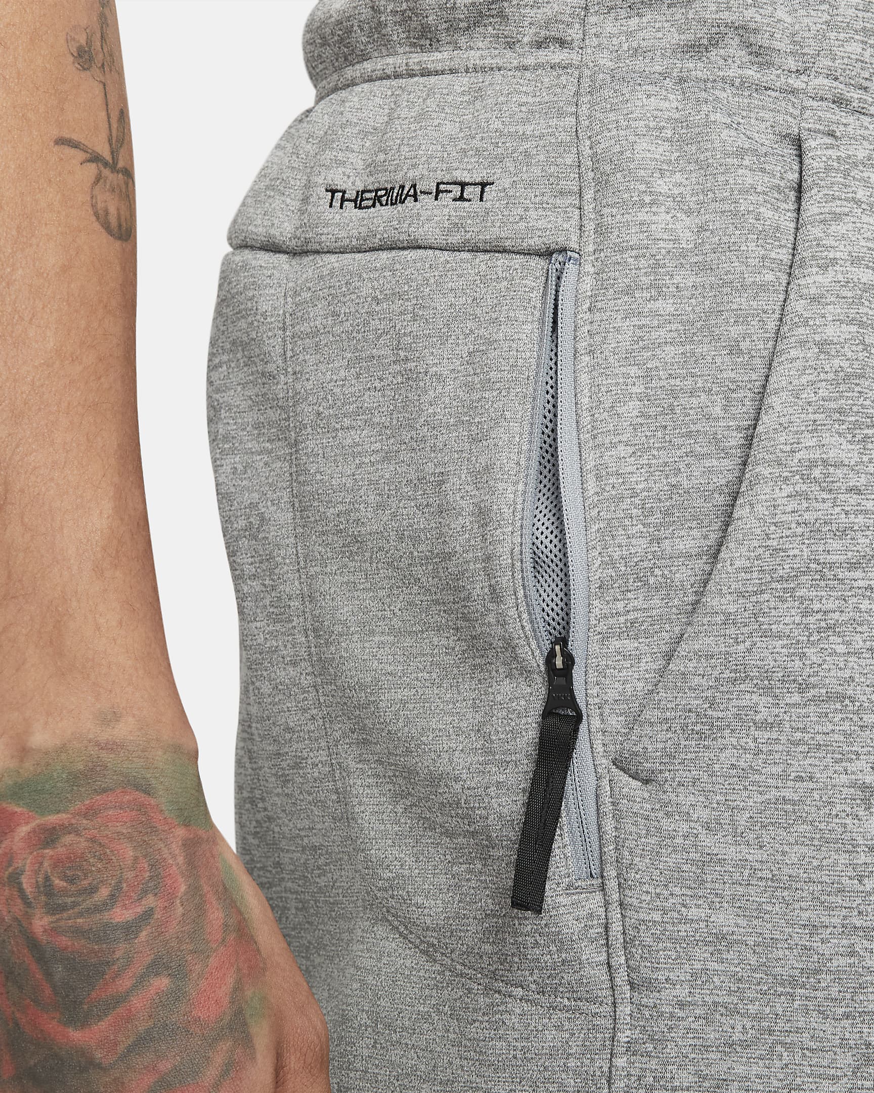 Pantalon de fitness fuselé Therma-FIT Nike Therma pour homme - Dark Grey Heather/Particle Grey/Noir