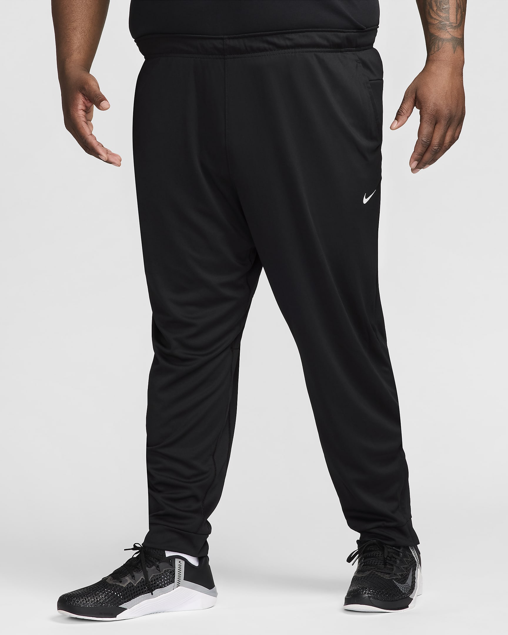 Nike Totality vielseitige Hose mit schmal zulaufender Passform und für Herren - Schwarz/Weiß